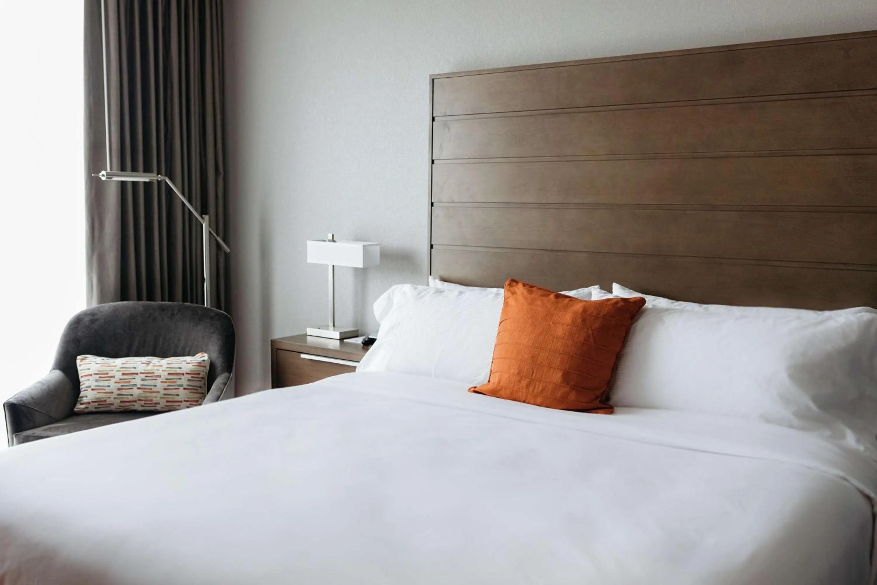 Living room, Bed in Revel Hotel, Tapestry Collection By Hilton