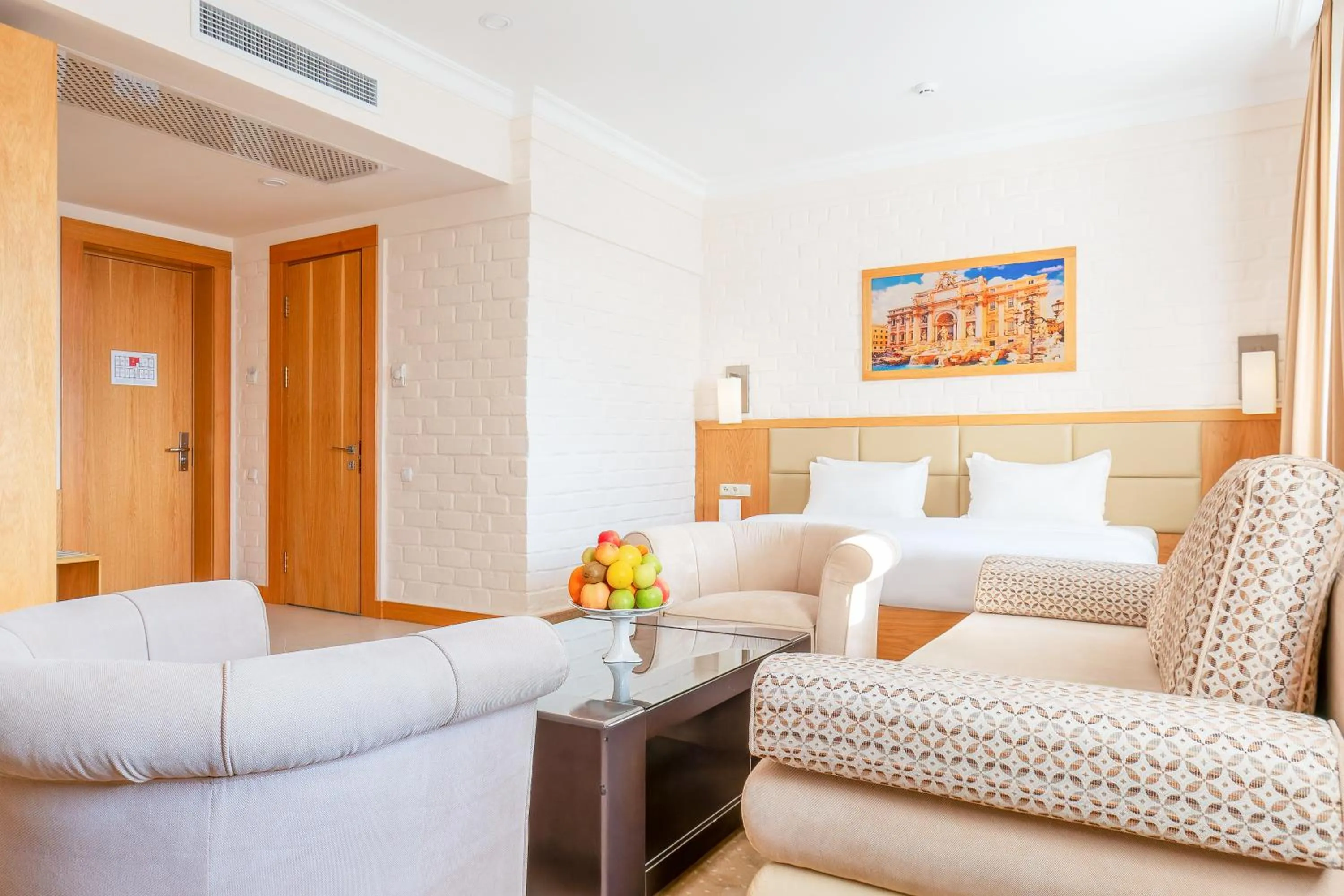 Seating area, Bed in Praga Hotel