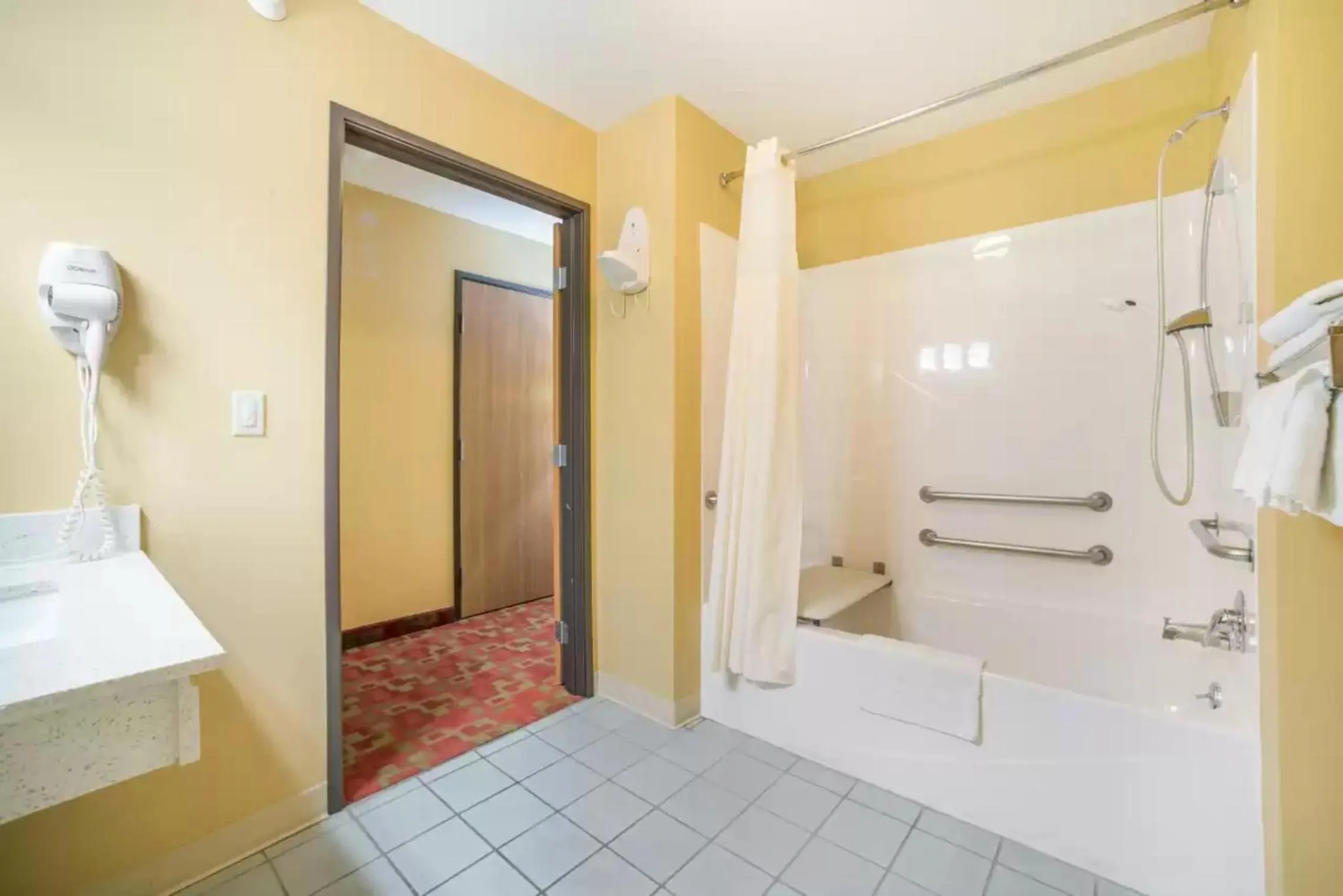 Bathroom, Bed in Quality Inn O'Fallon IL - St Louis