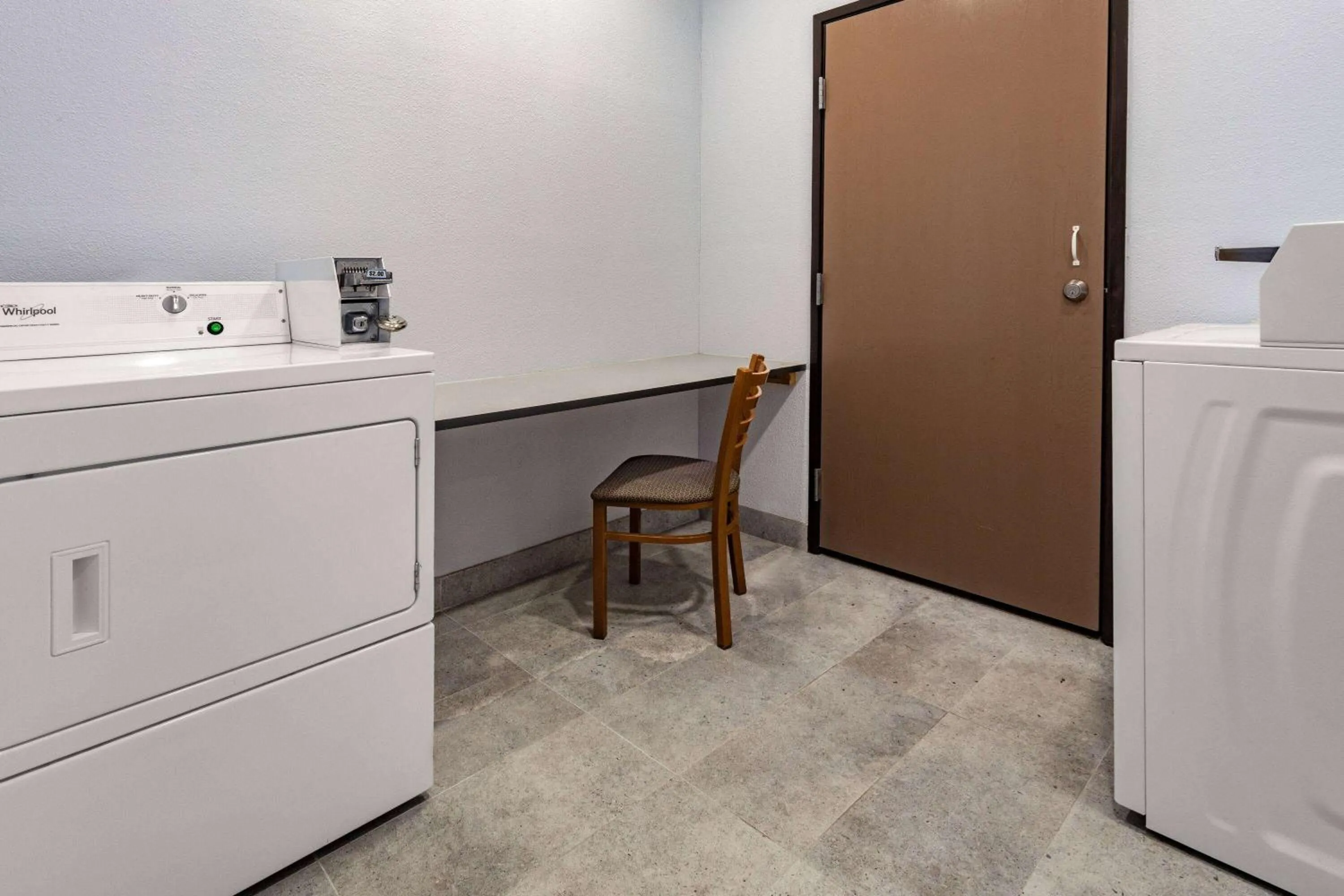 washing machine in AmericInn by Wyndham Quincy