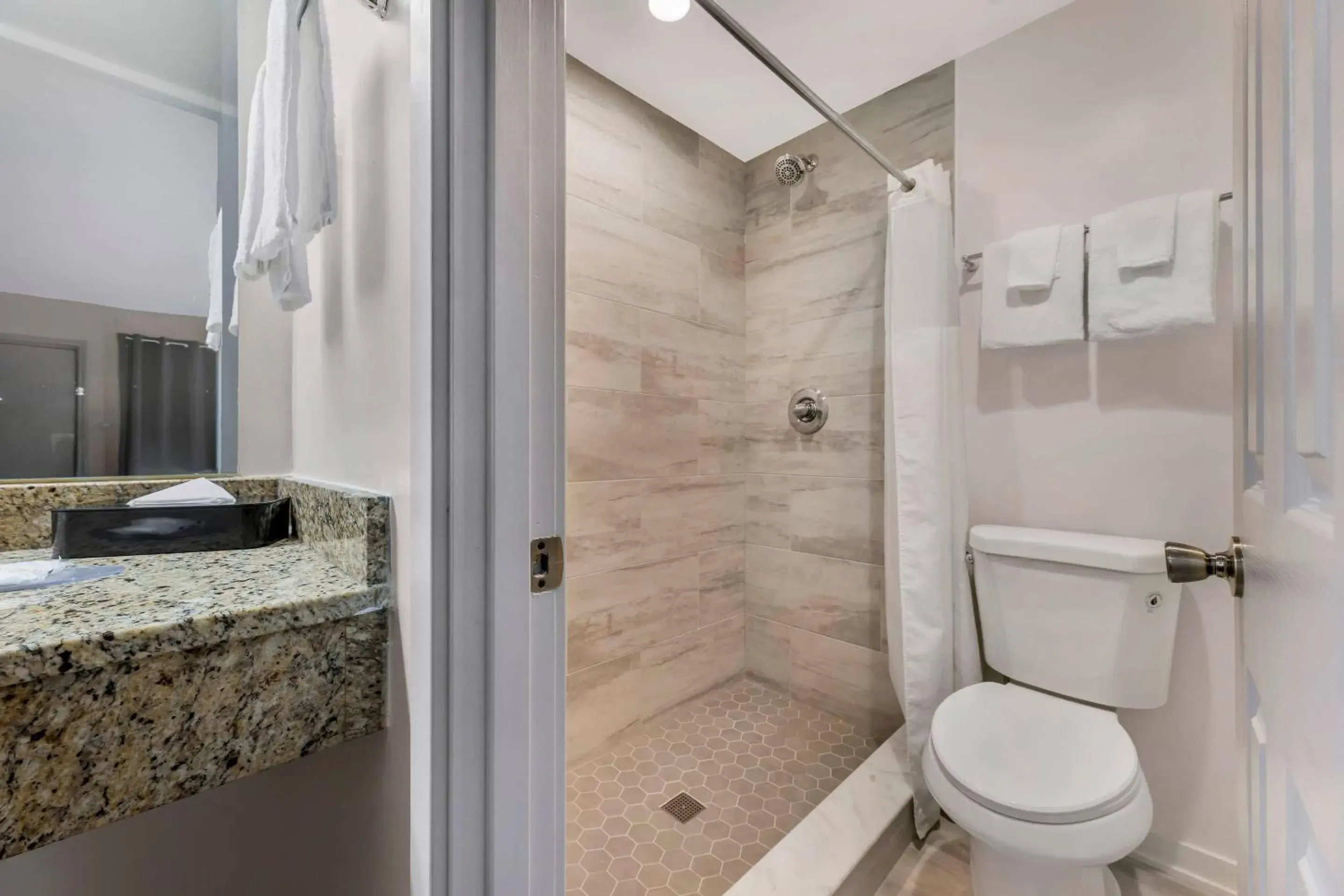 Bedroom in Rodeway Inn Lyons - La Grange Bedroom in Rodeway Inn Lyons - La Grange