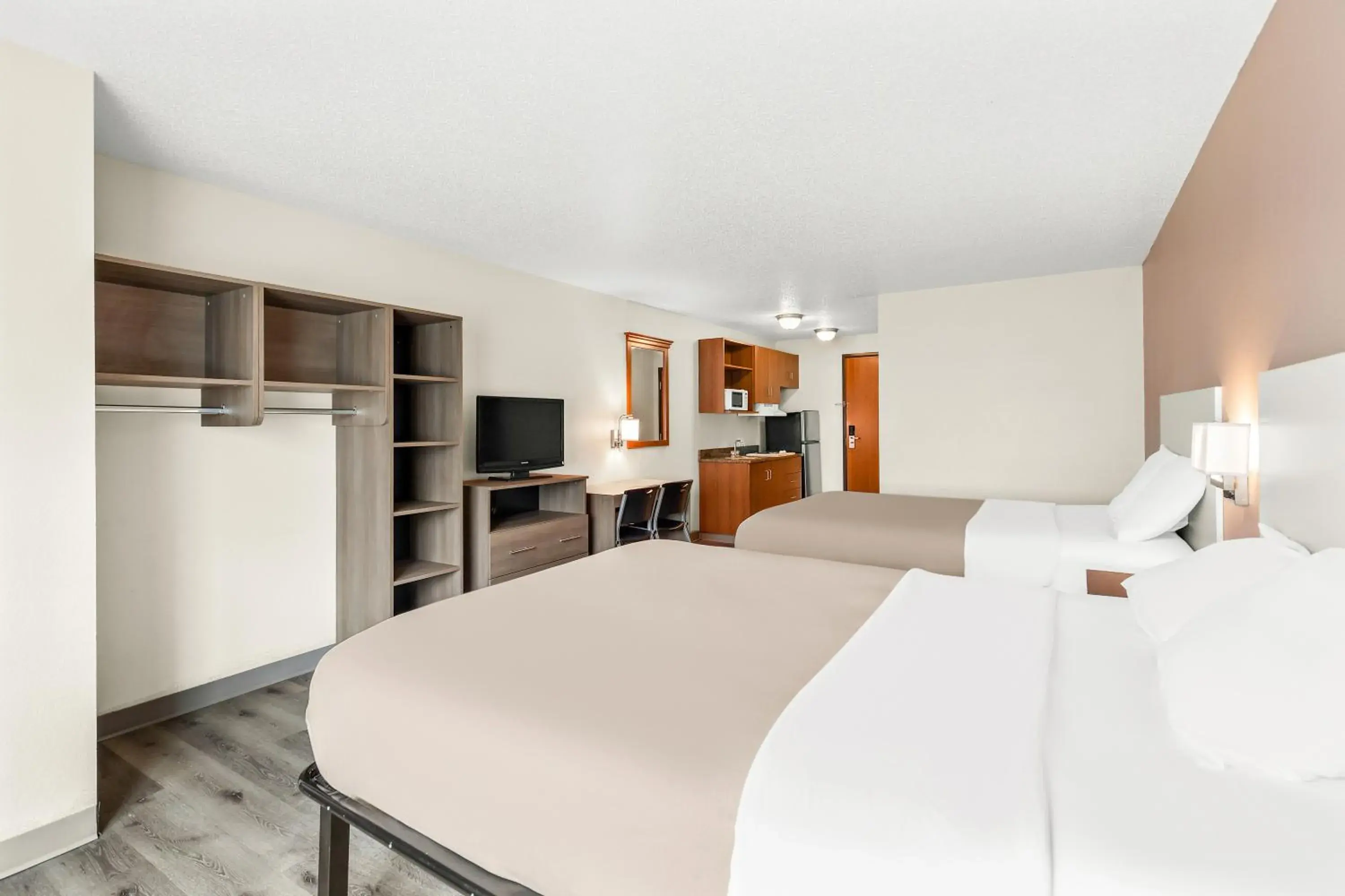 TV and multimedia, Bed in Welcome Suites-O'Fallon TV and multimedia, Bed in Welcome Suites-O'Fallon