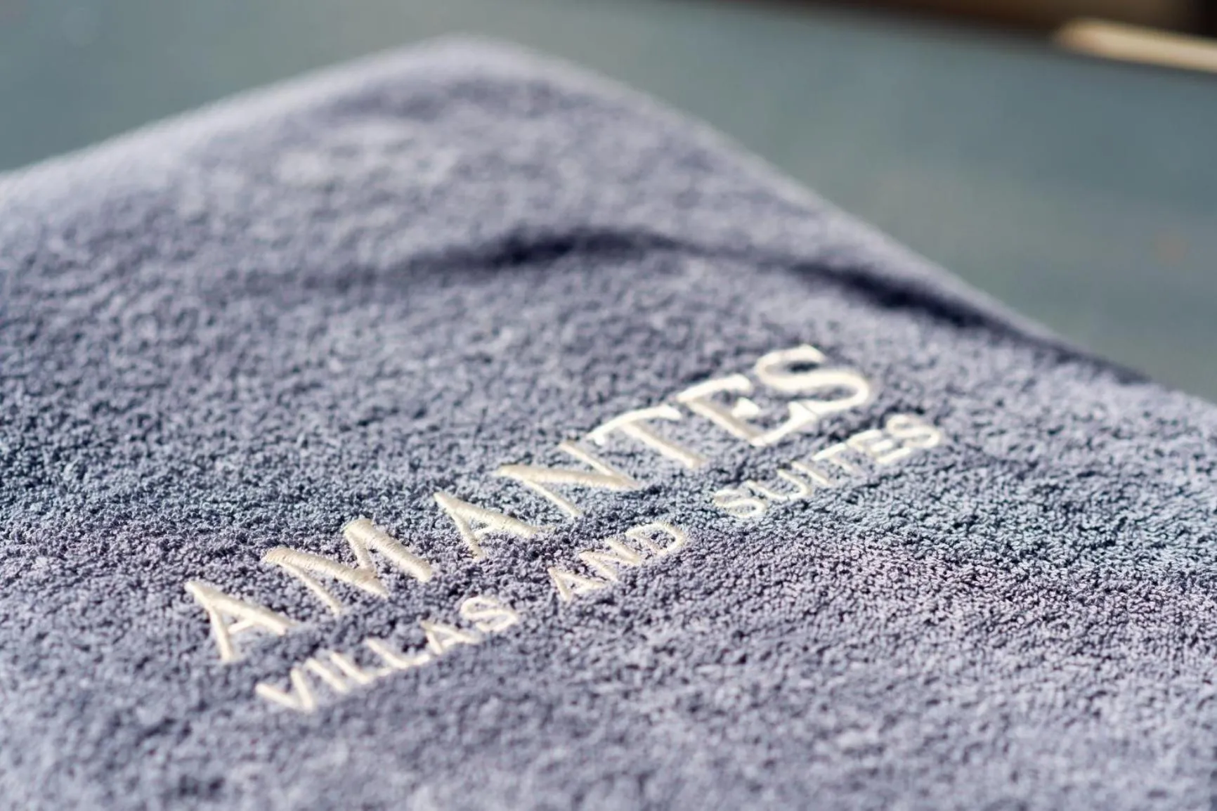 Property logo or sign in Amantes Villas and Suites