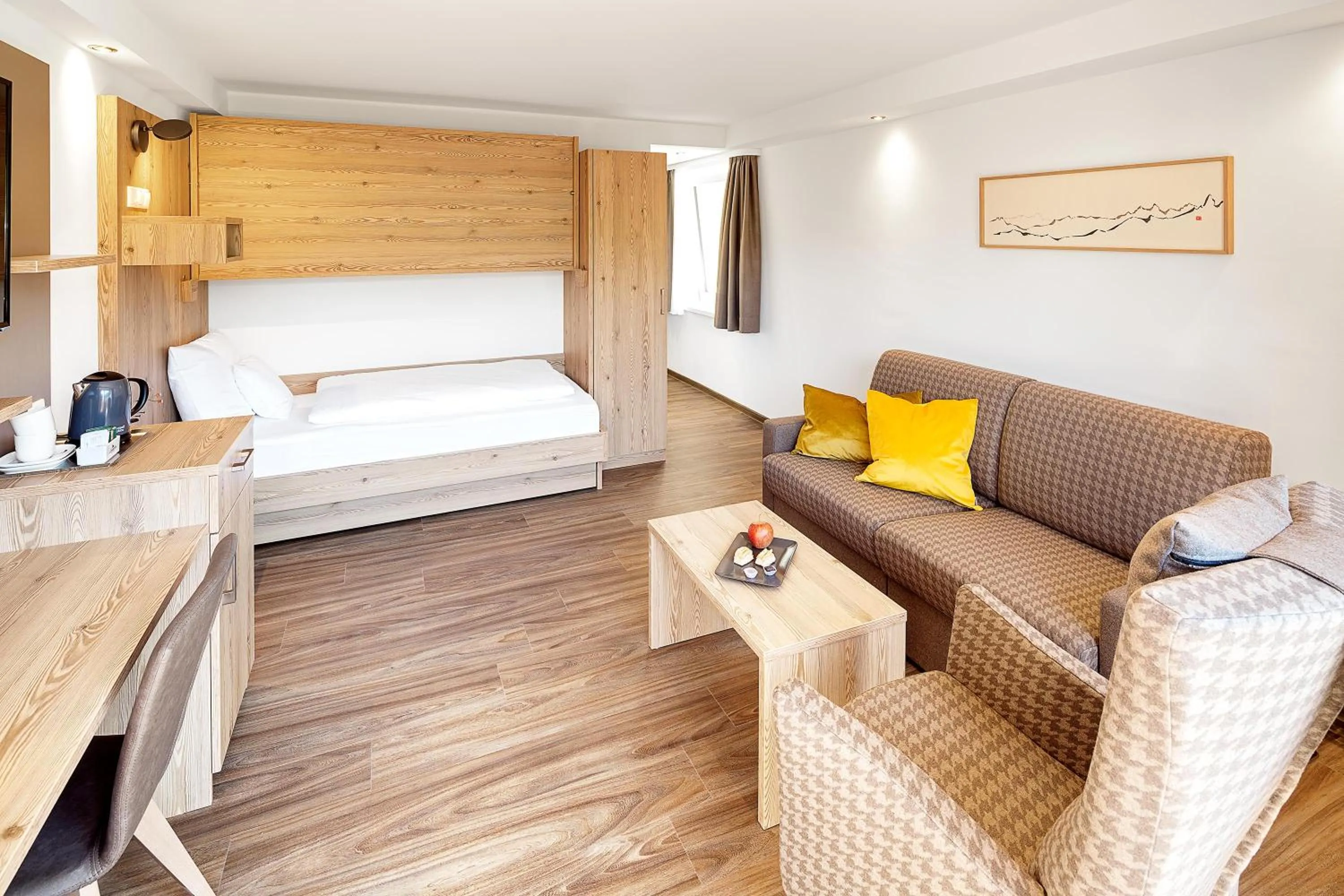 Living room, Bed in Hotel Kühberg