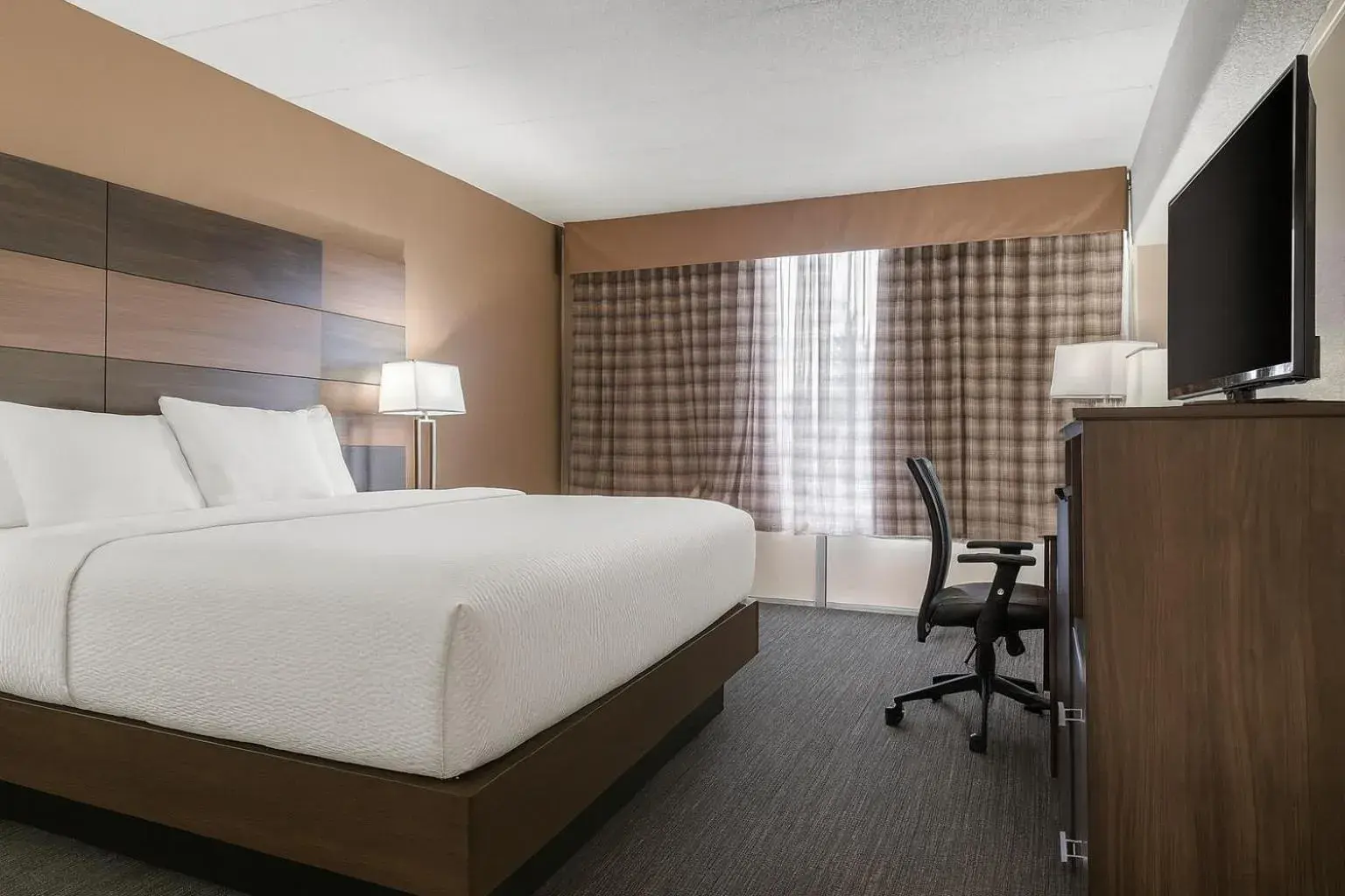 Bed in Quality Inn and Conference Center Bed in Quality Inn and Conference Center