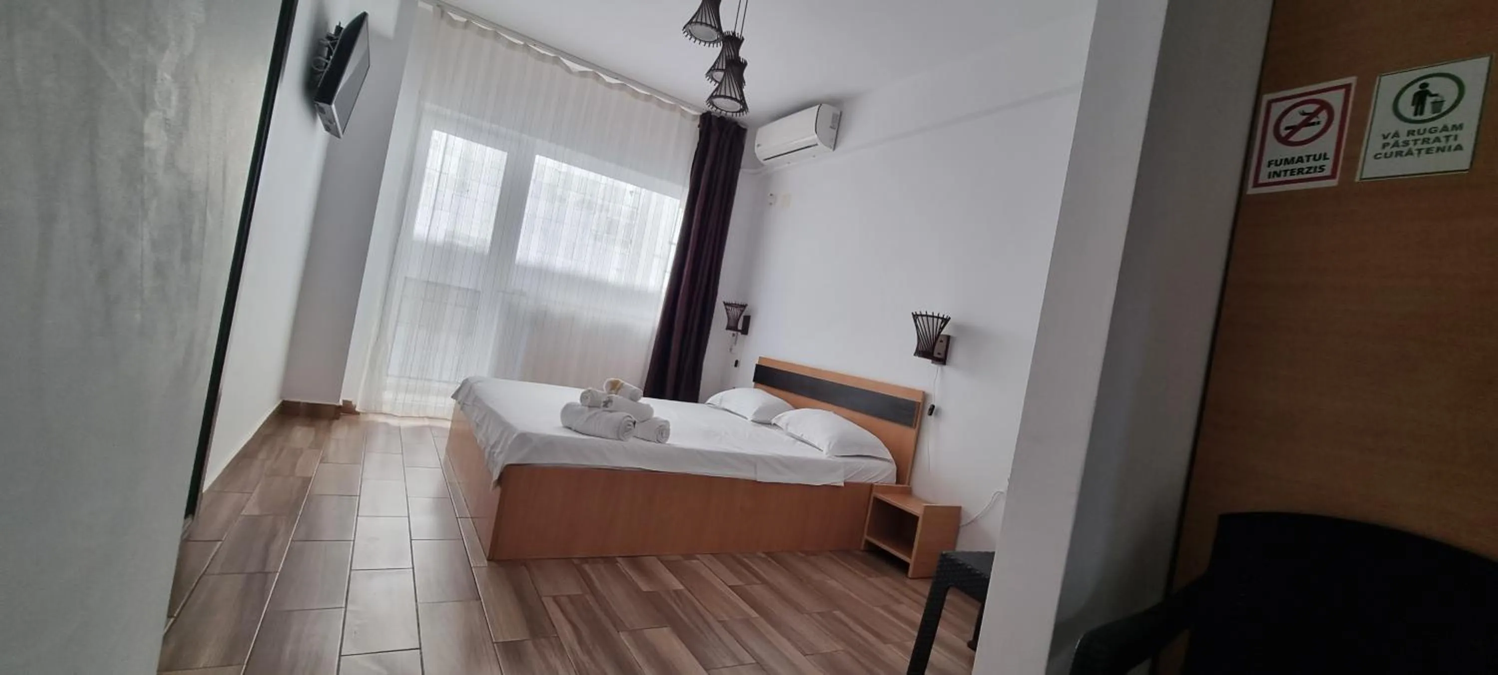 Bed in Hotel Blue Sky Resort