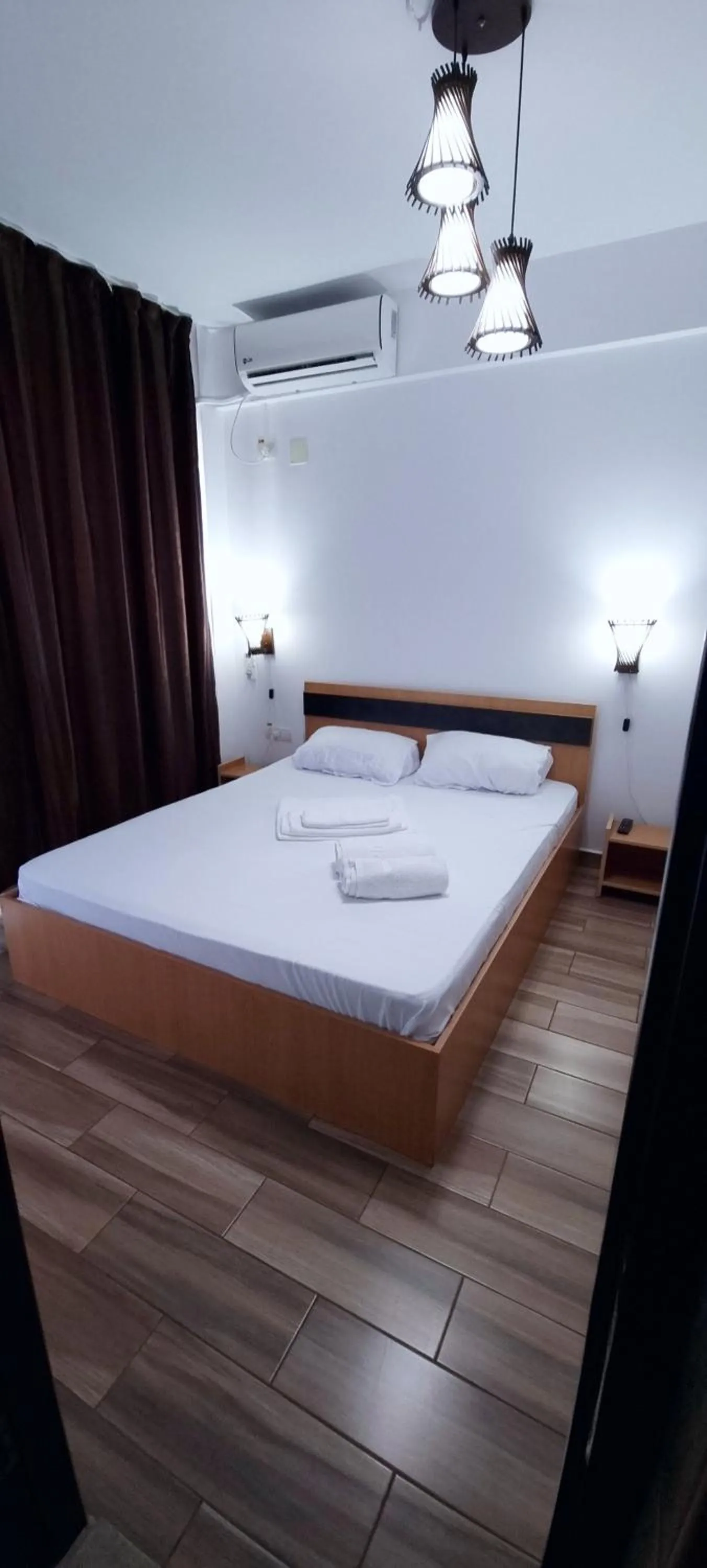 Bed in Hotel Blue Sky Resort