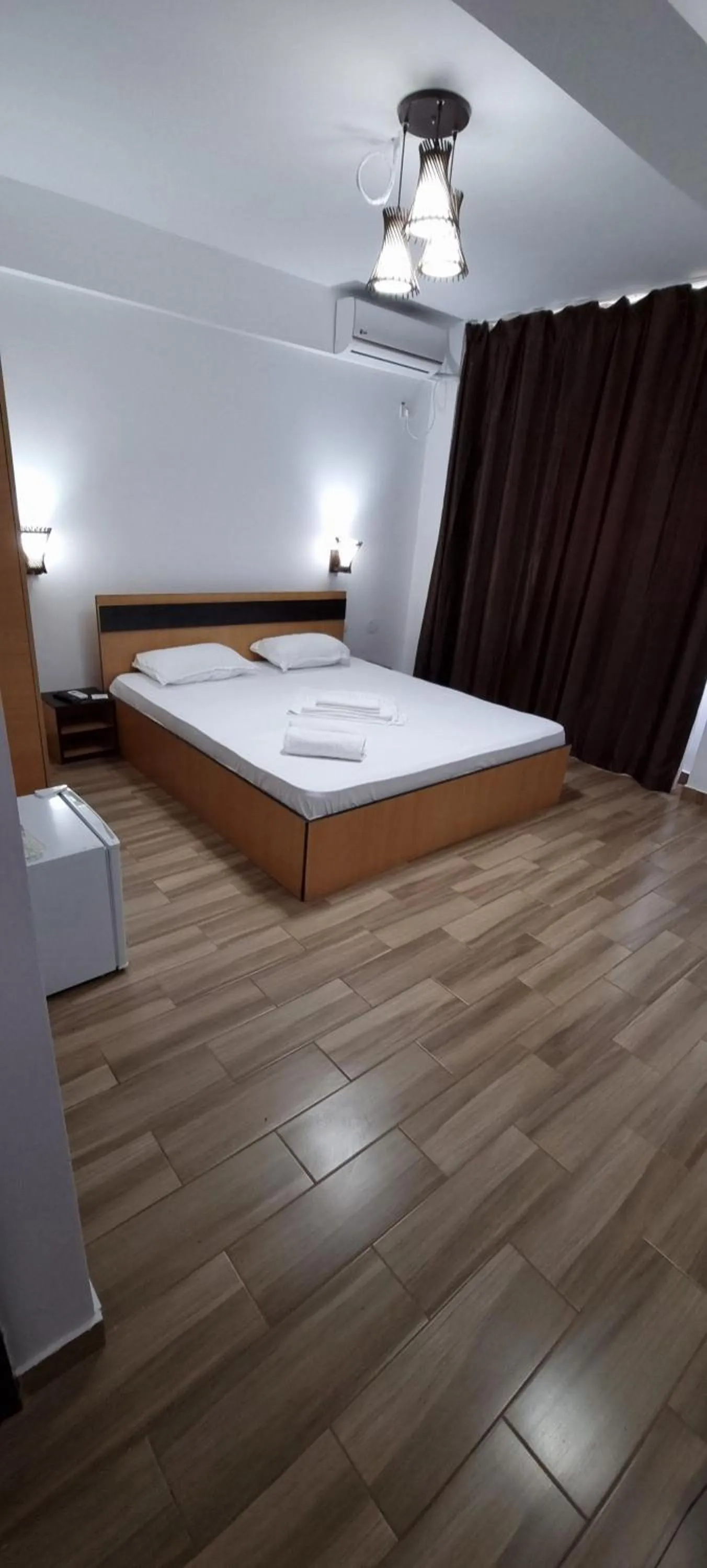 Bed in Hotel Blue Sky Resort