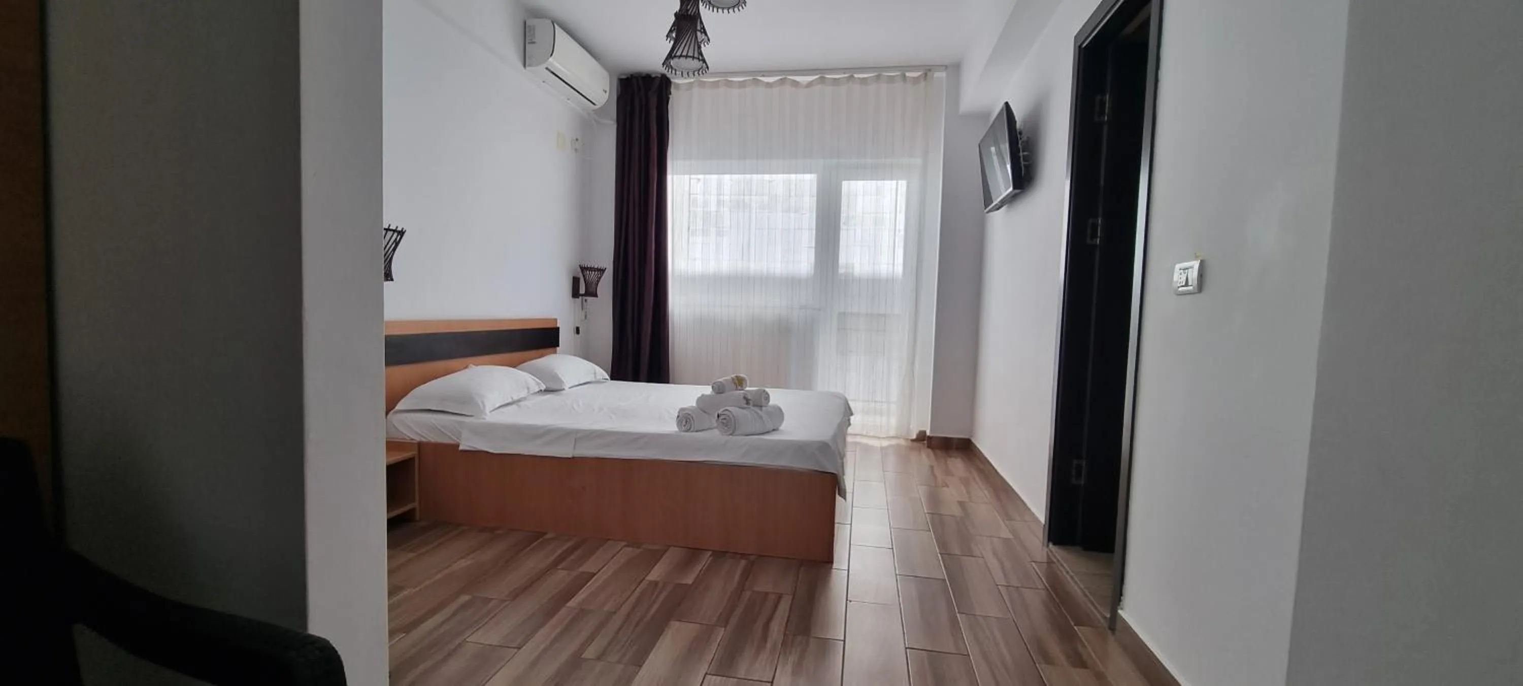 Bed in Hotel Blue Sky Resort