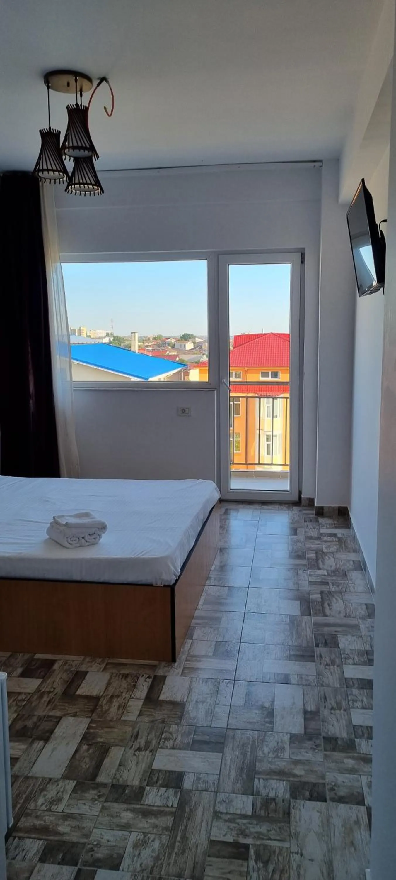 Bed in Hotel Blue Sky Resort