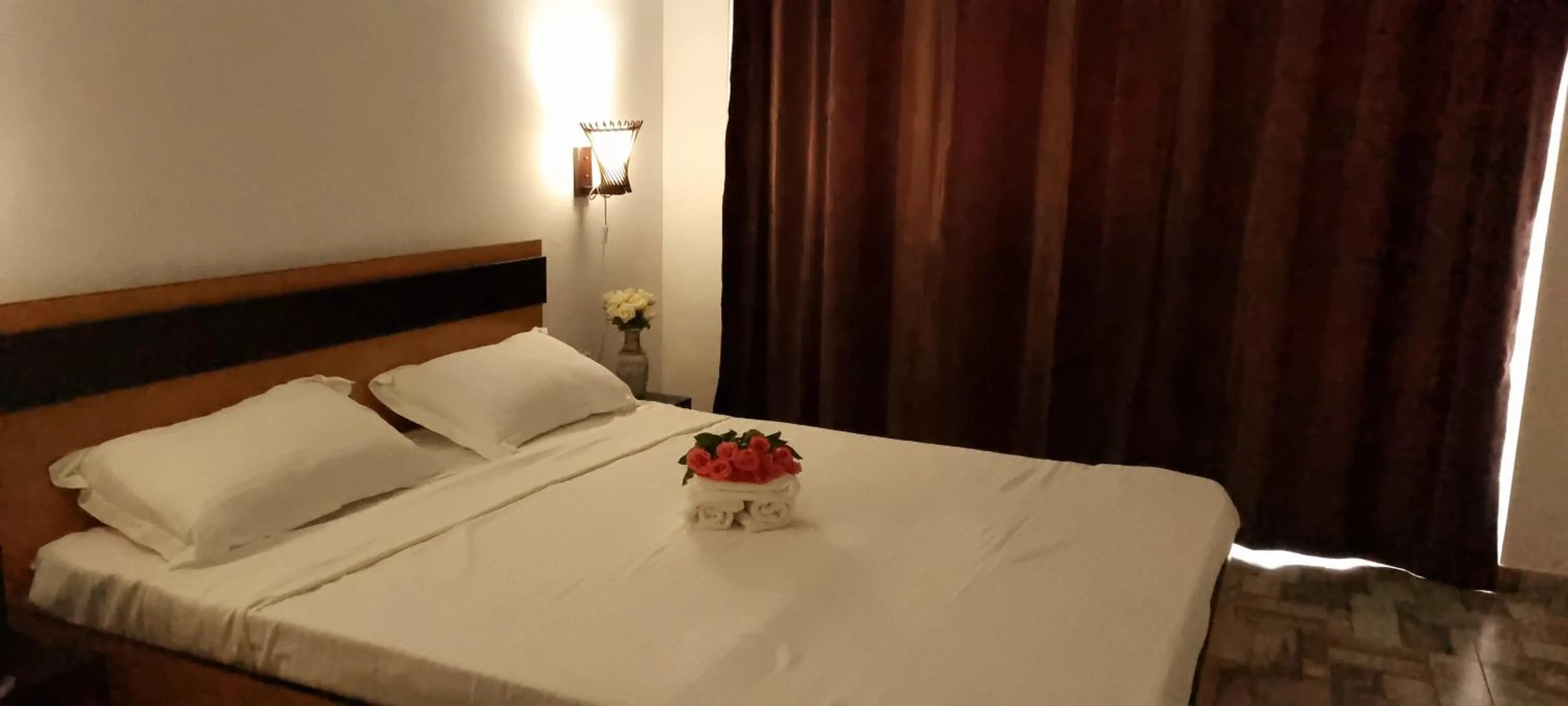 Bed in Hotel Blue Sky Resort