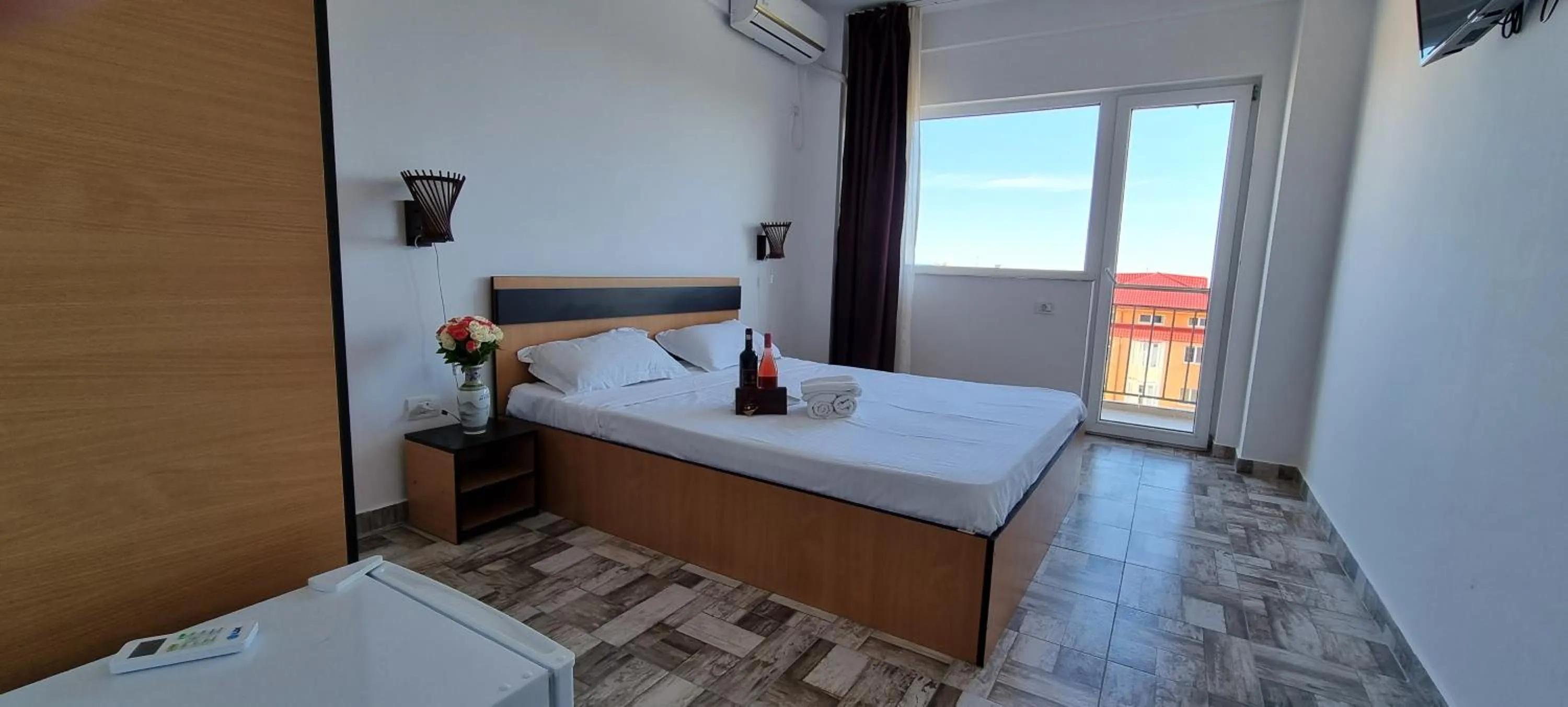 Bed in Hotel Blue Sky Resort