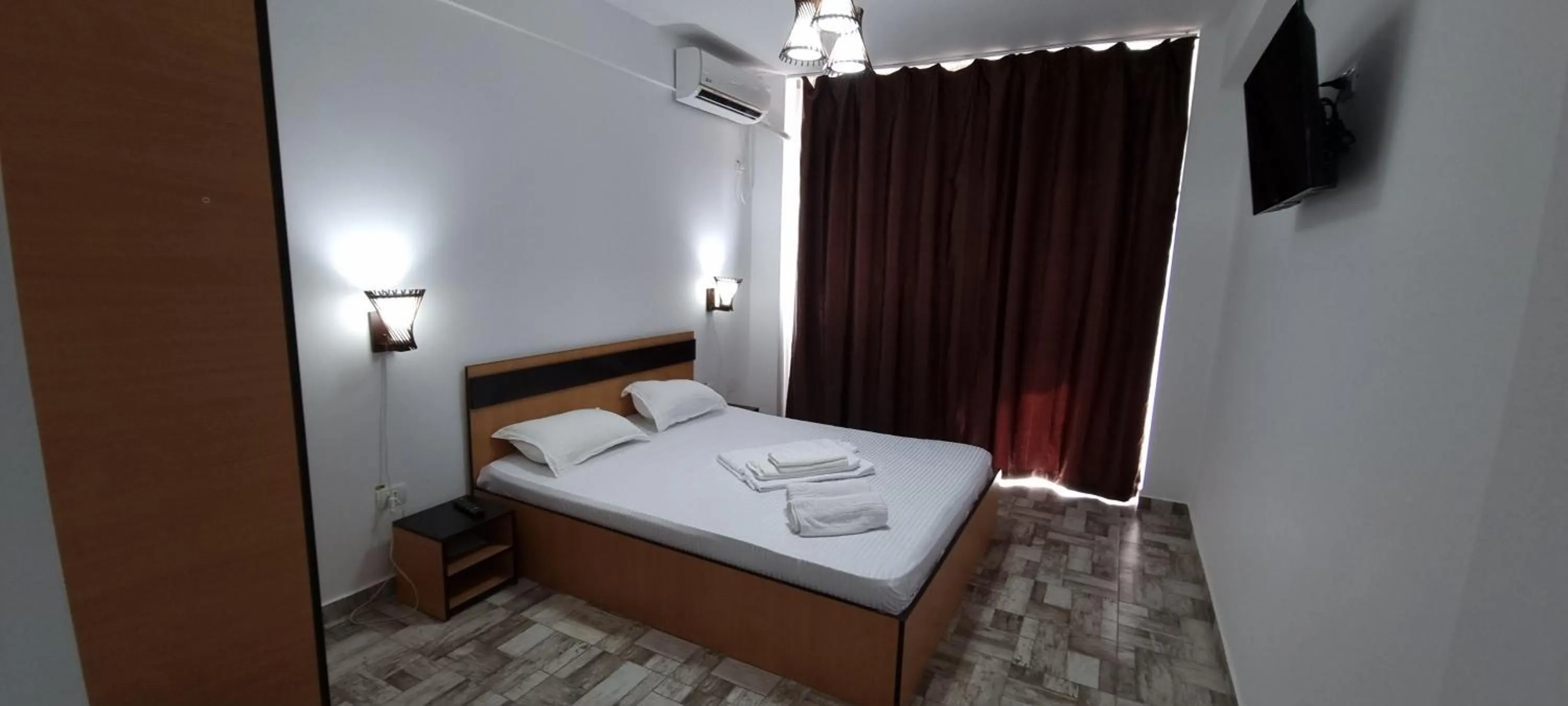 Bed in Hotel Blue Sky Resort