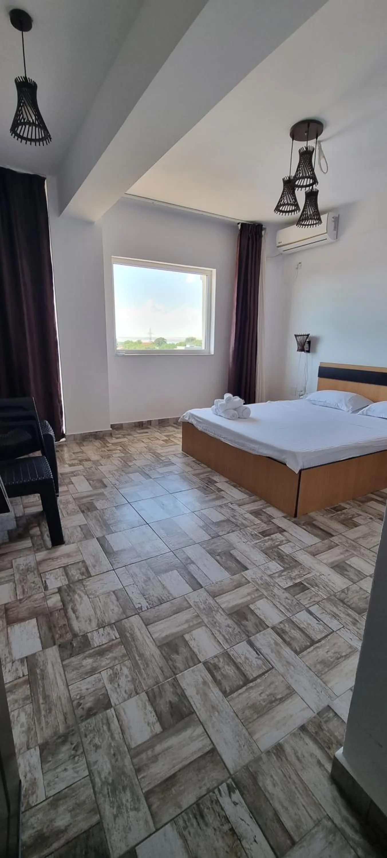 Bed in Hotel Blue Sky Resort