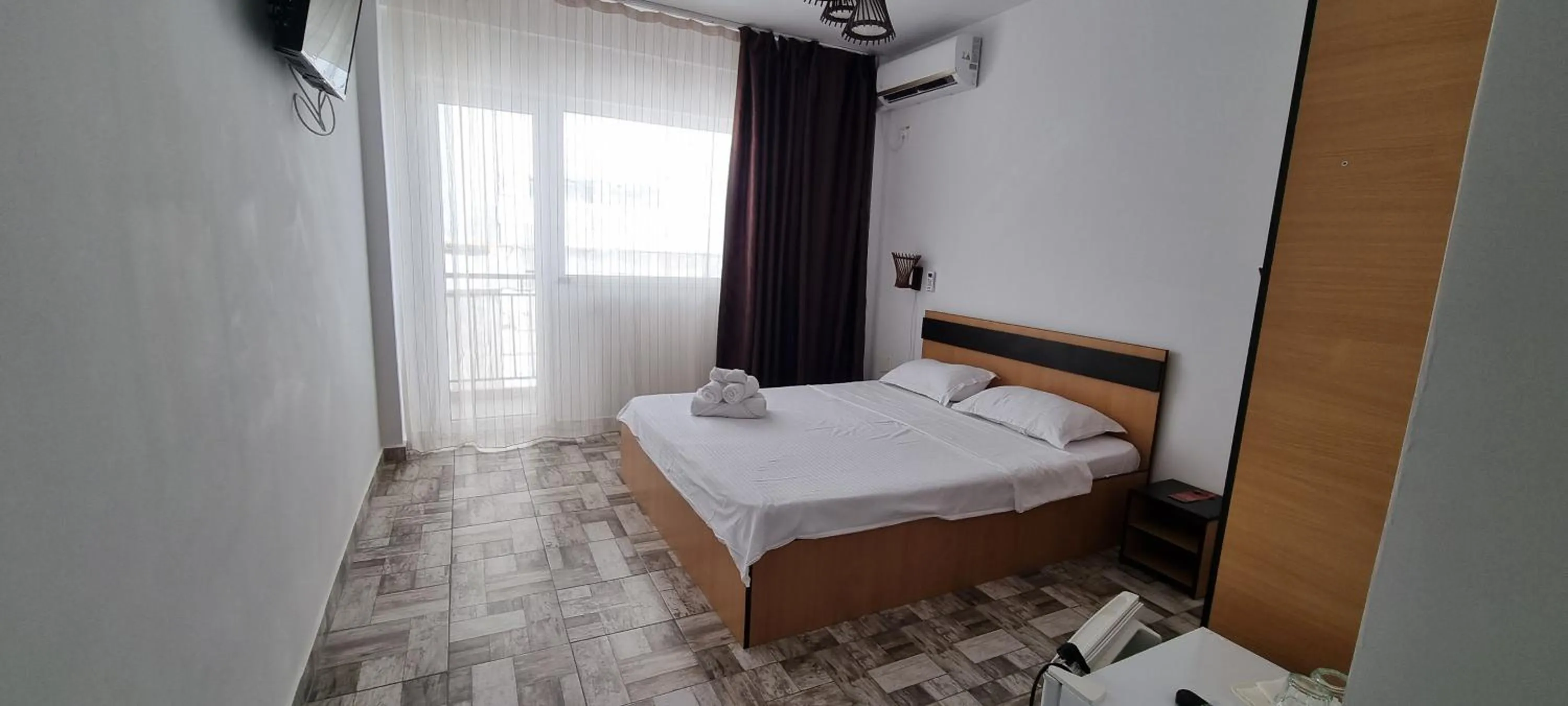 Bedroom, Bed in Hotel Blue Sky Resort