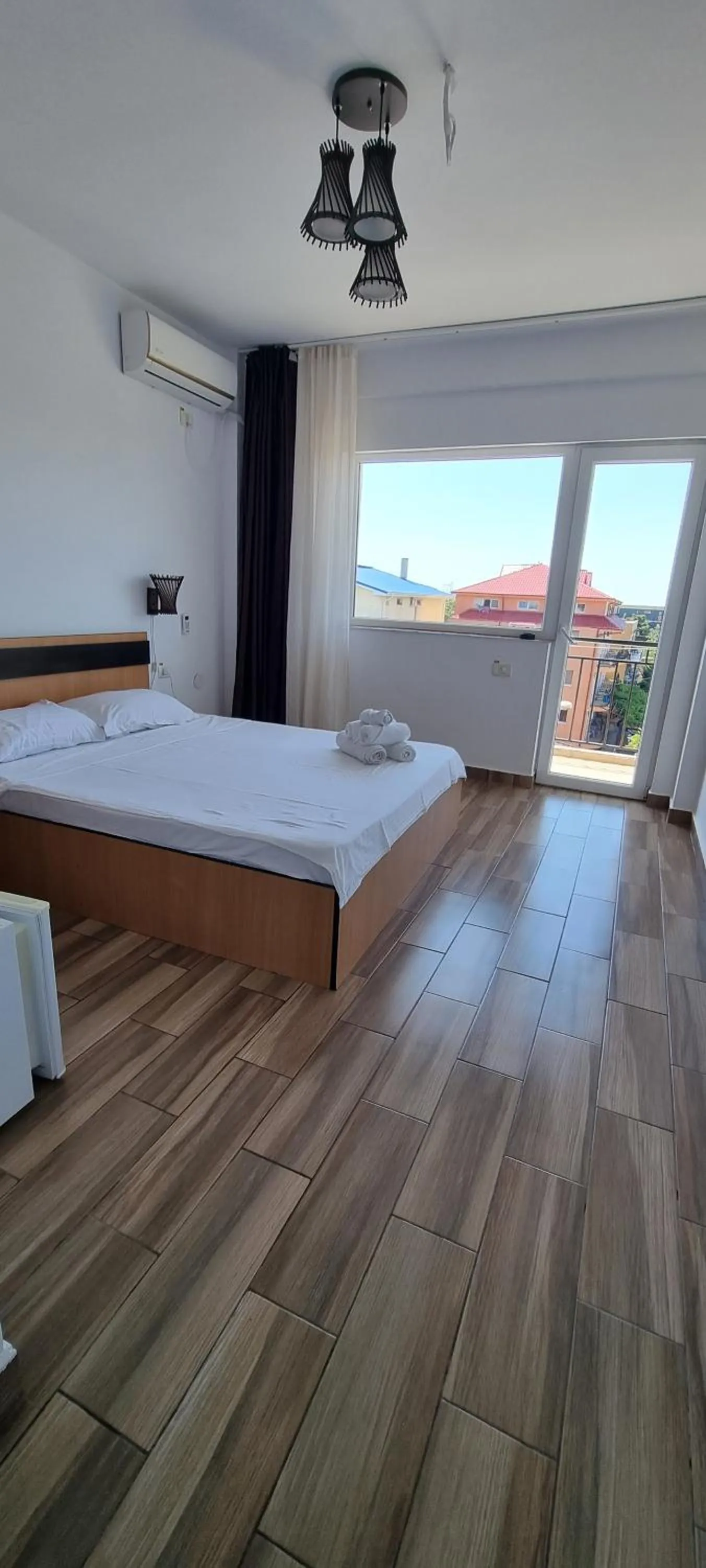 Bed in Hotel Blue Sky Resort