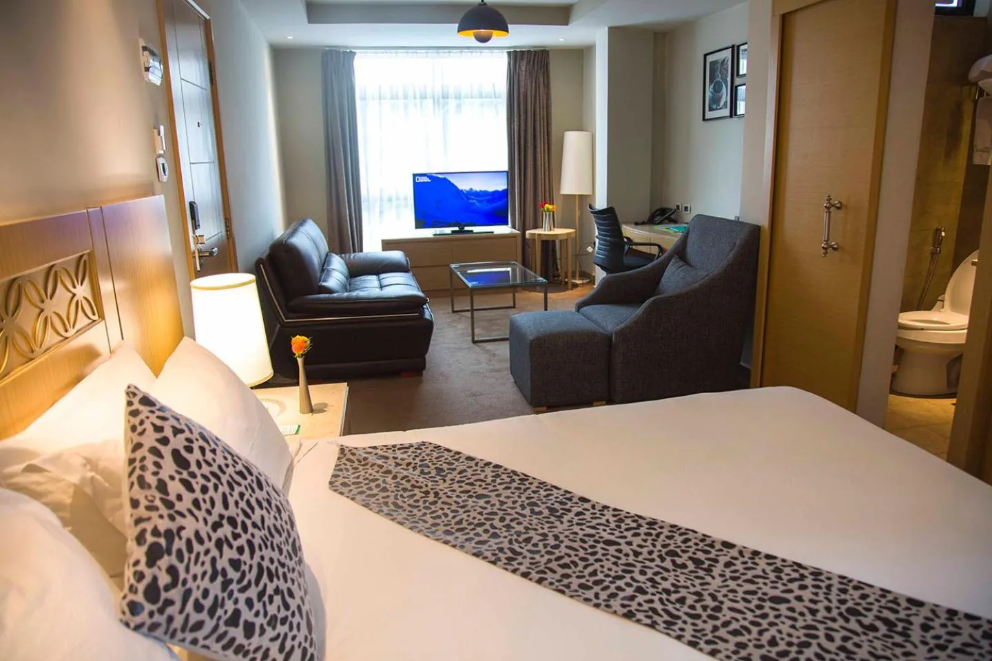 TV and multimedia, Bed in Vamos Addis Hotel