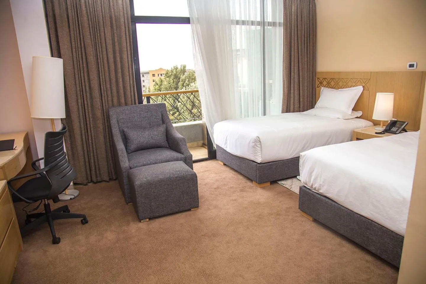 Bed in Vamos Addis Hotel