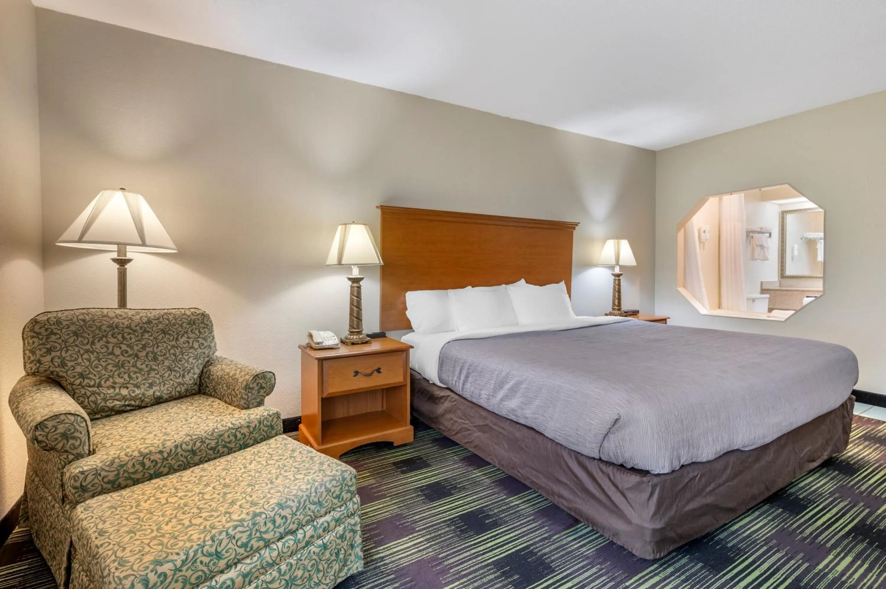 Bed in Quality Inn & Suites Near Amish Country