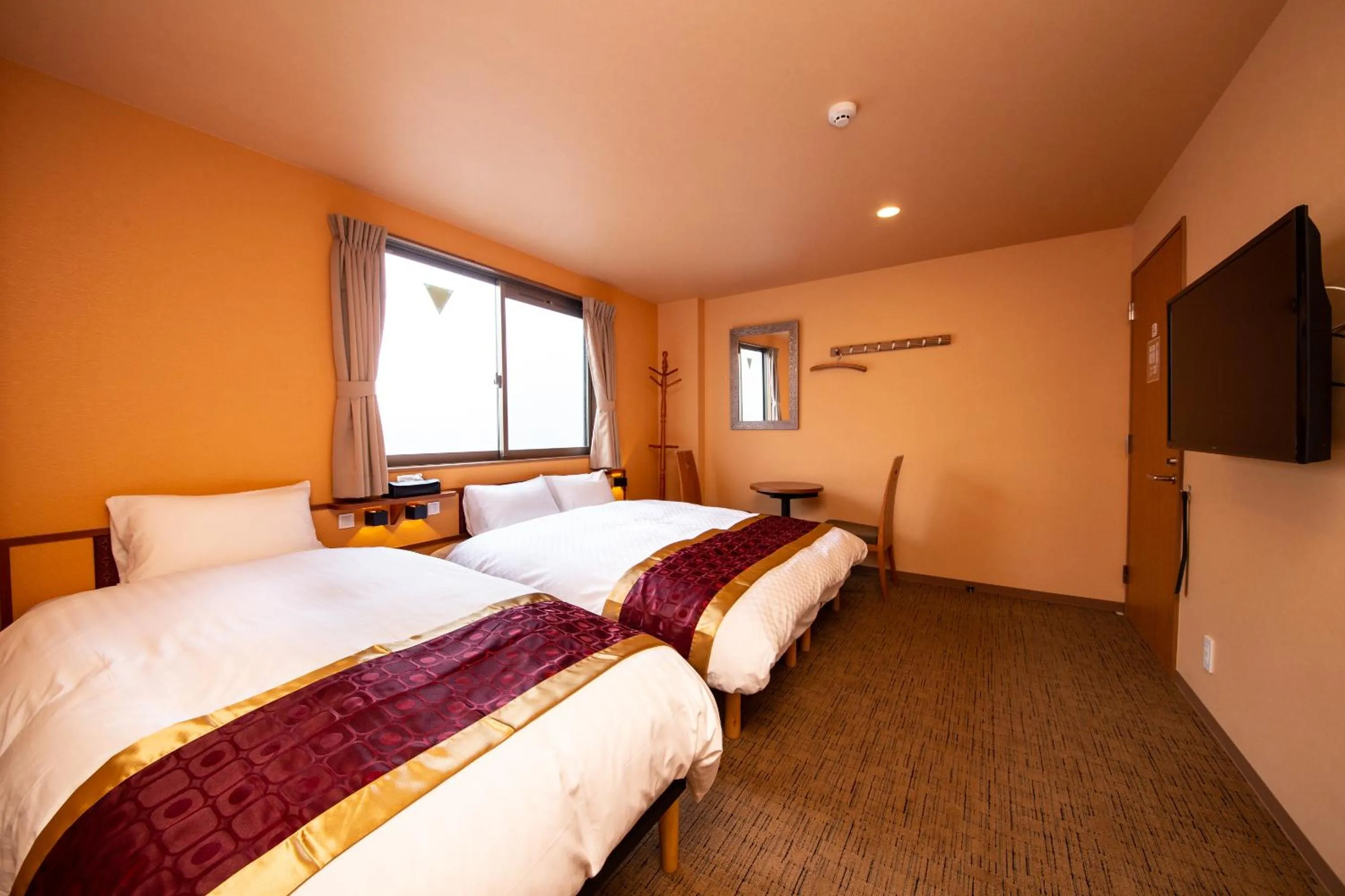 Bed in THE L.A. MART HOTEL KYOTO