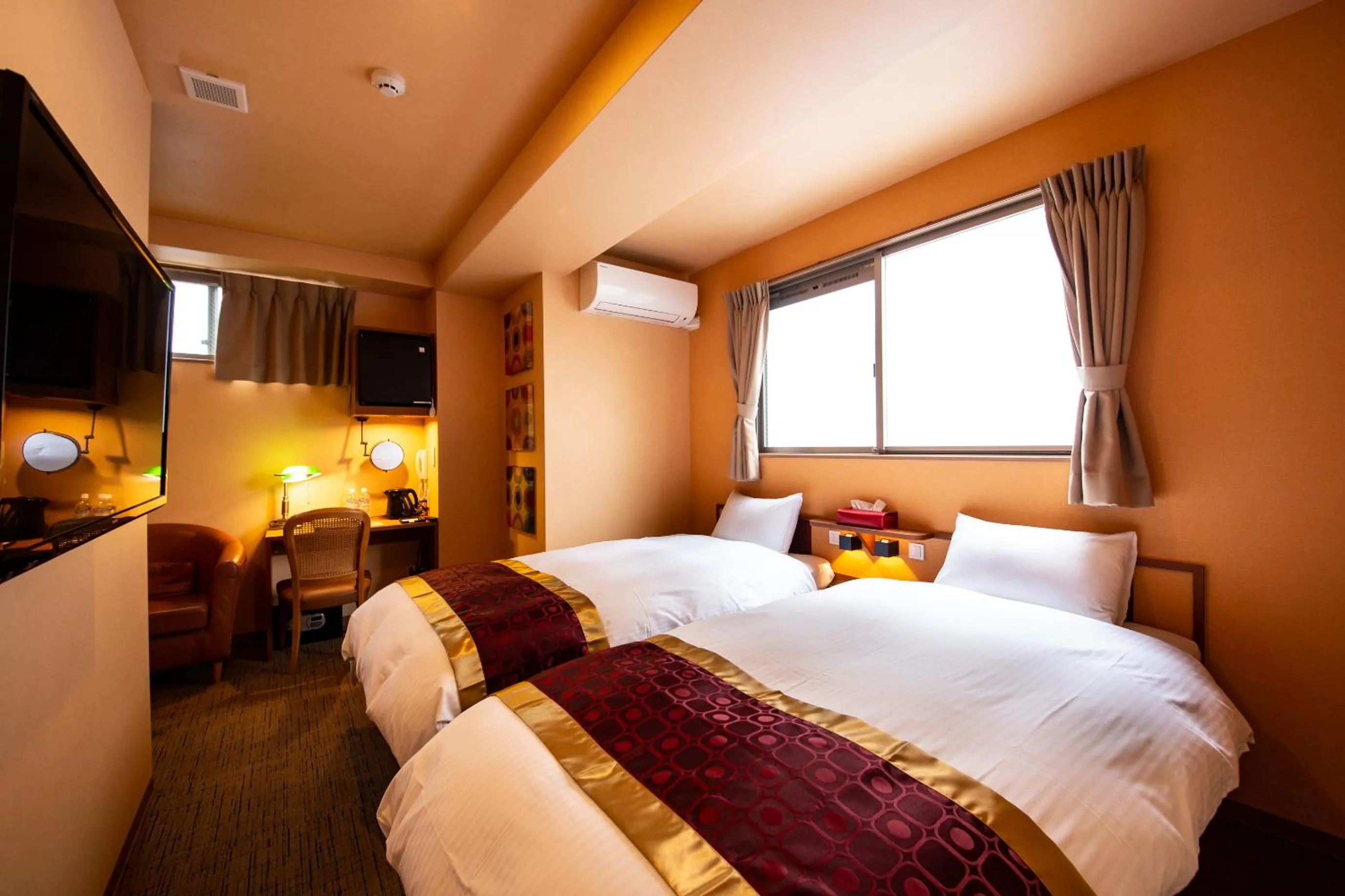 Bed in THE L.A. MART HOTEL KYOTO