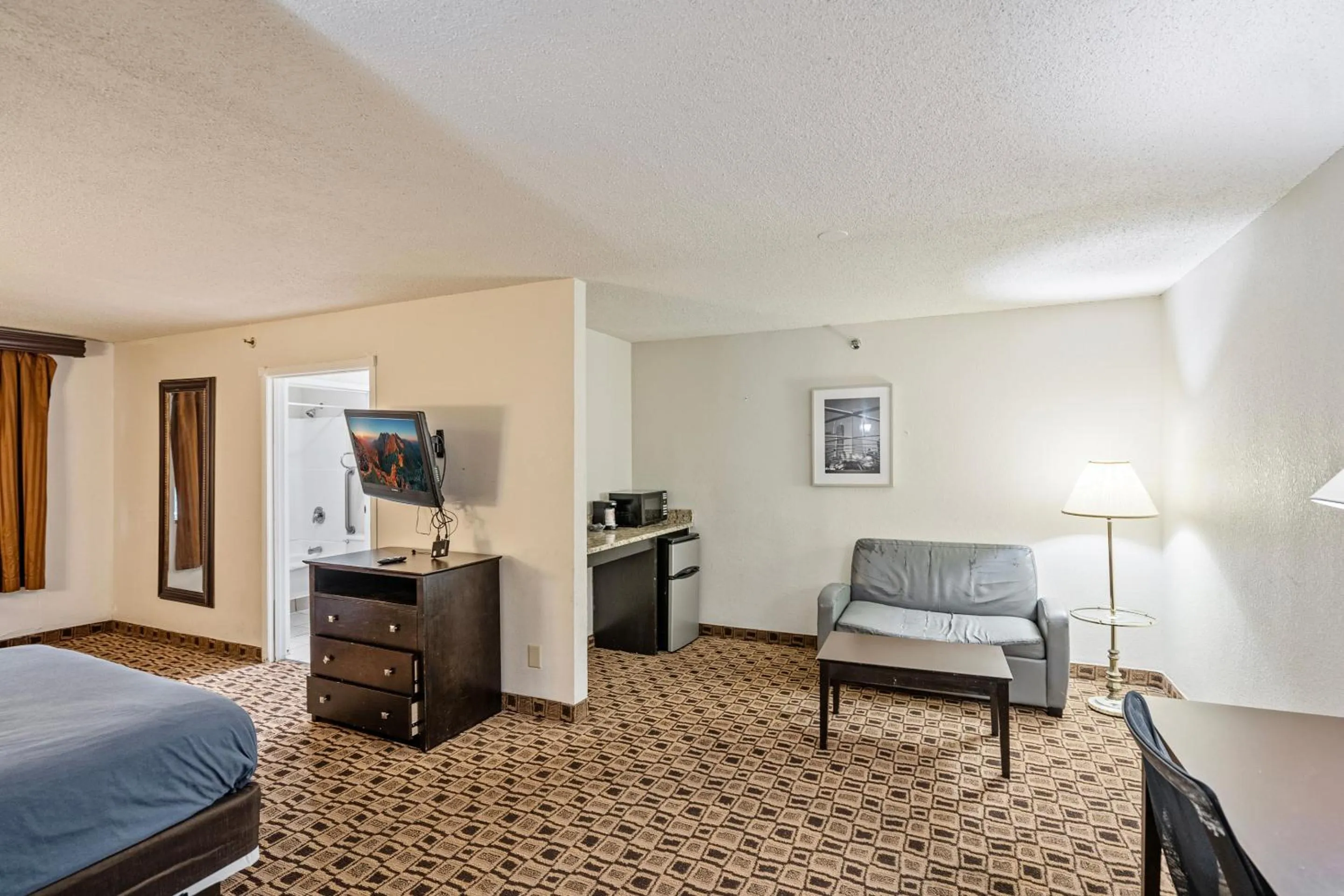 Bedroom, Bed in Coratel Plus Suites Wichita West Airport