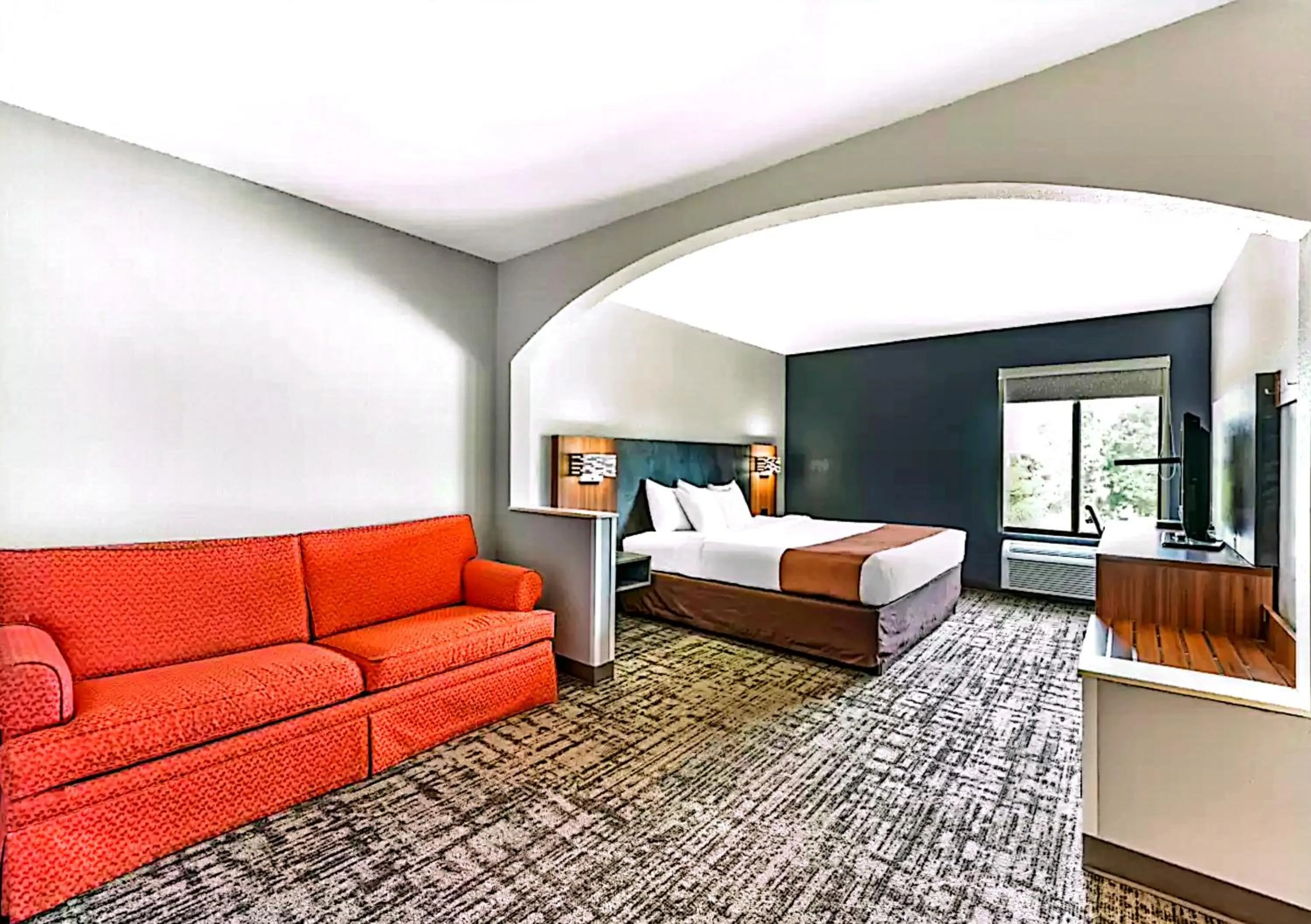 Bed in Quality Inn & Suites Manhattan