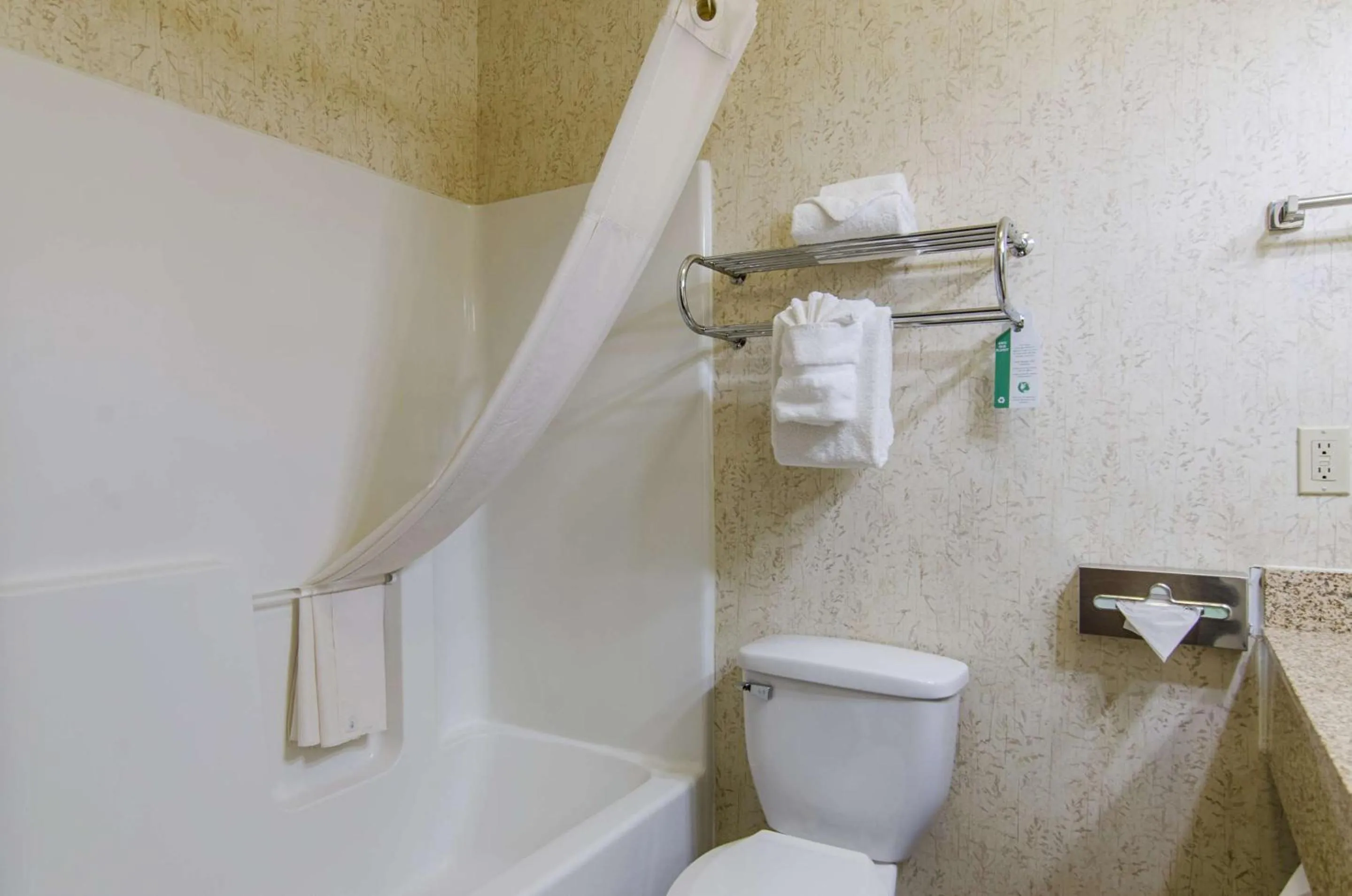 Bedroom in Quality Inn Junction City near Fort Riley