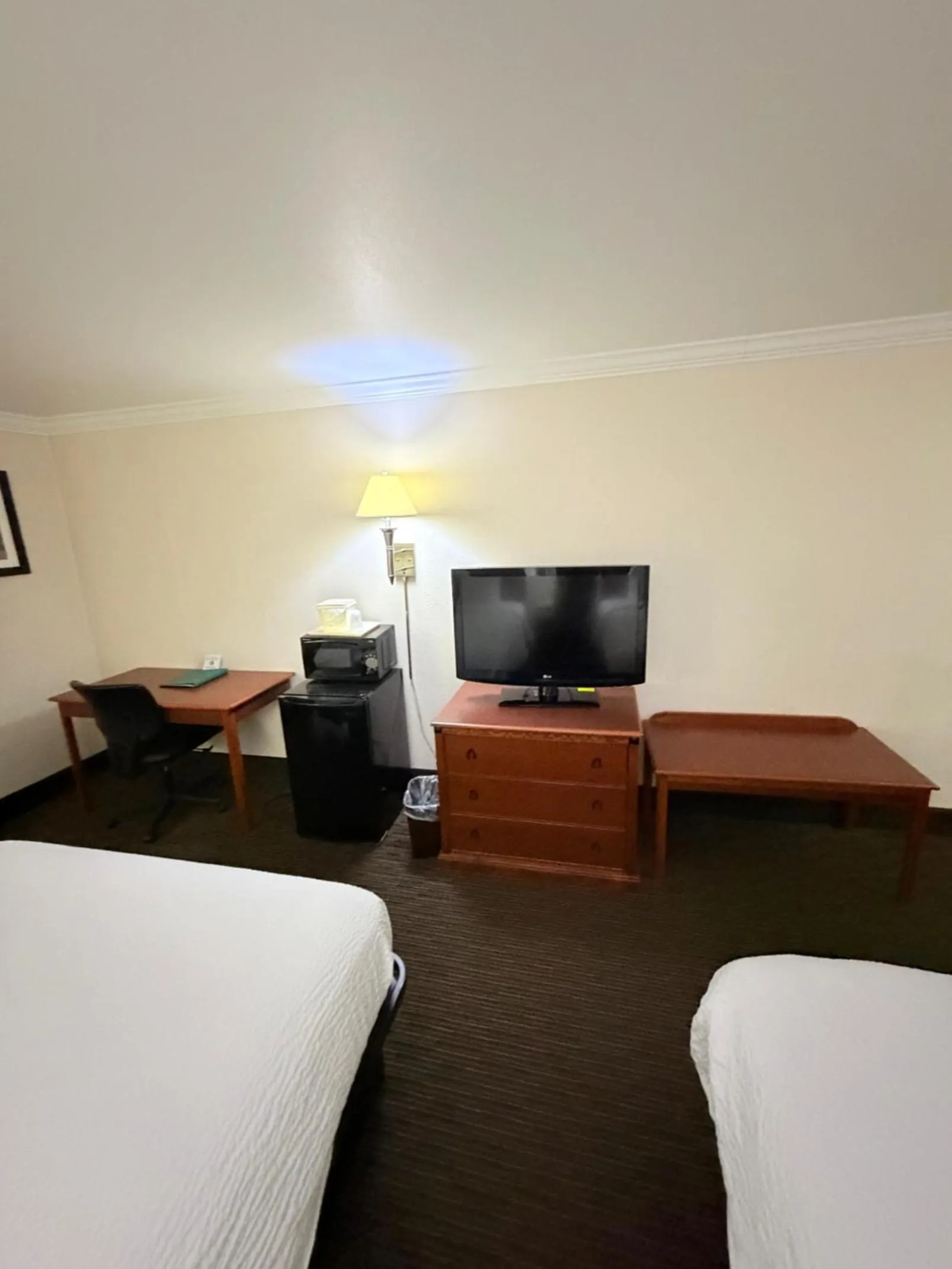 Bedroom, Bed in Sunflower Inn & Suites