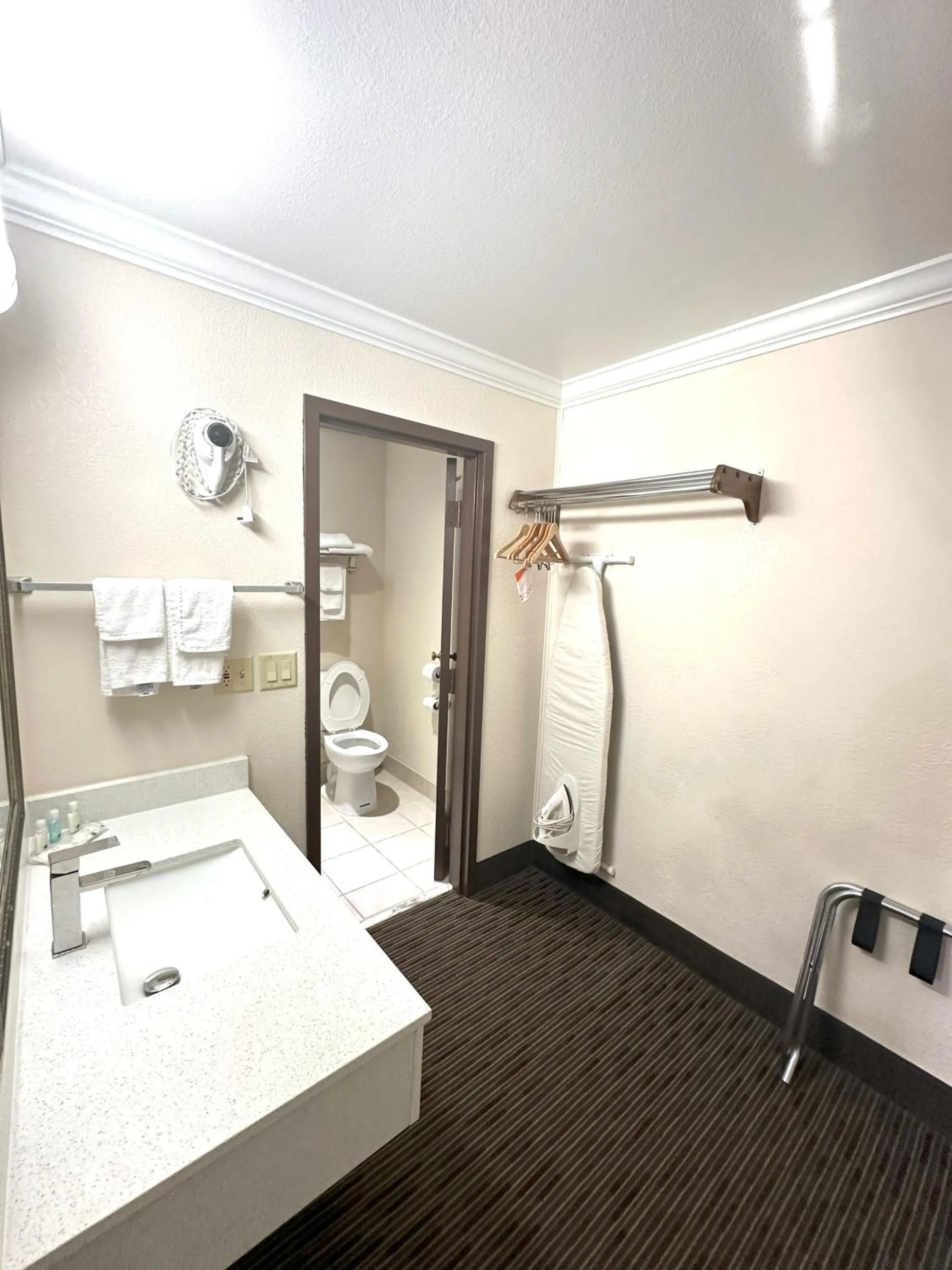 Toilet in Quality Inn & Suites Salina West