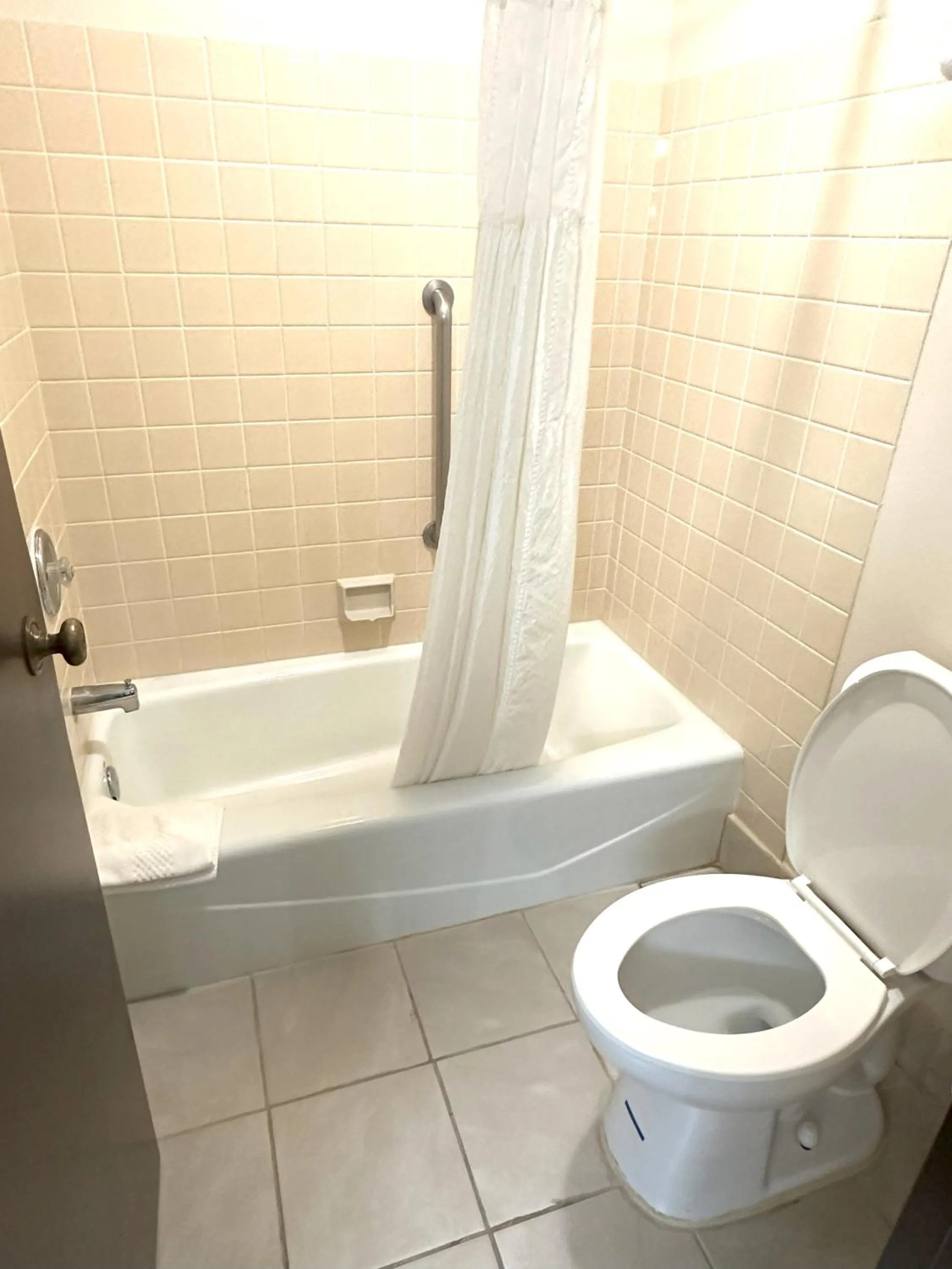 Toilet in Quality Inn & Suites Salina West