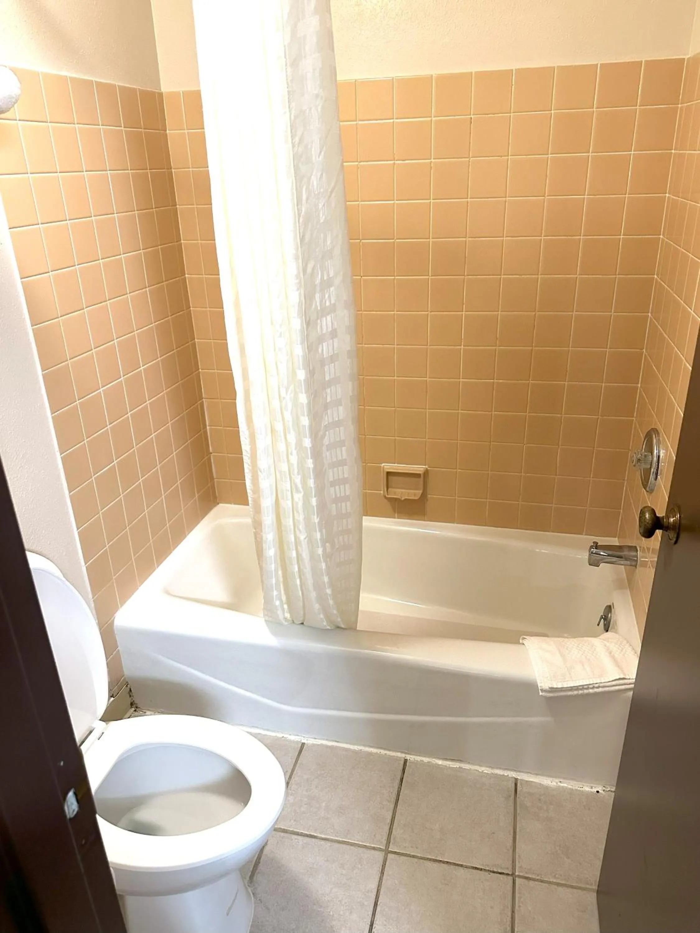 Toilet in Quality Inn & Suites Salina West