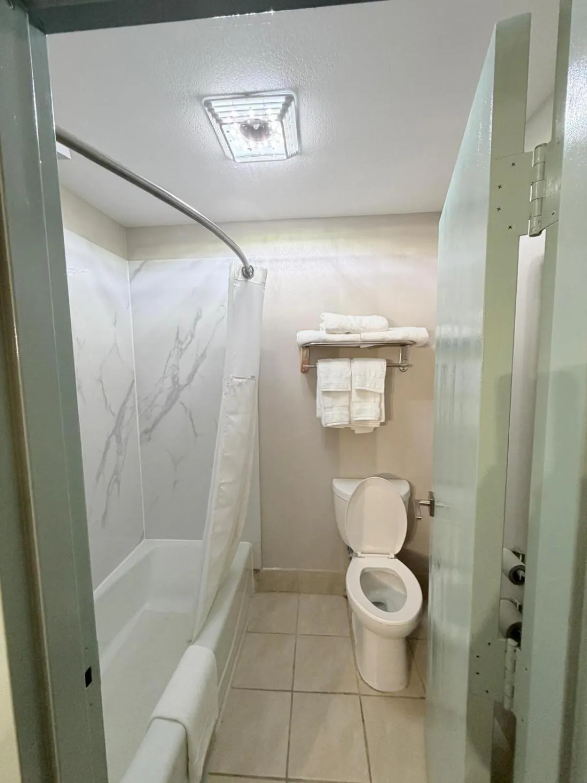 Toilet in Wyndham Garden Salina Conference Center