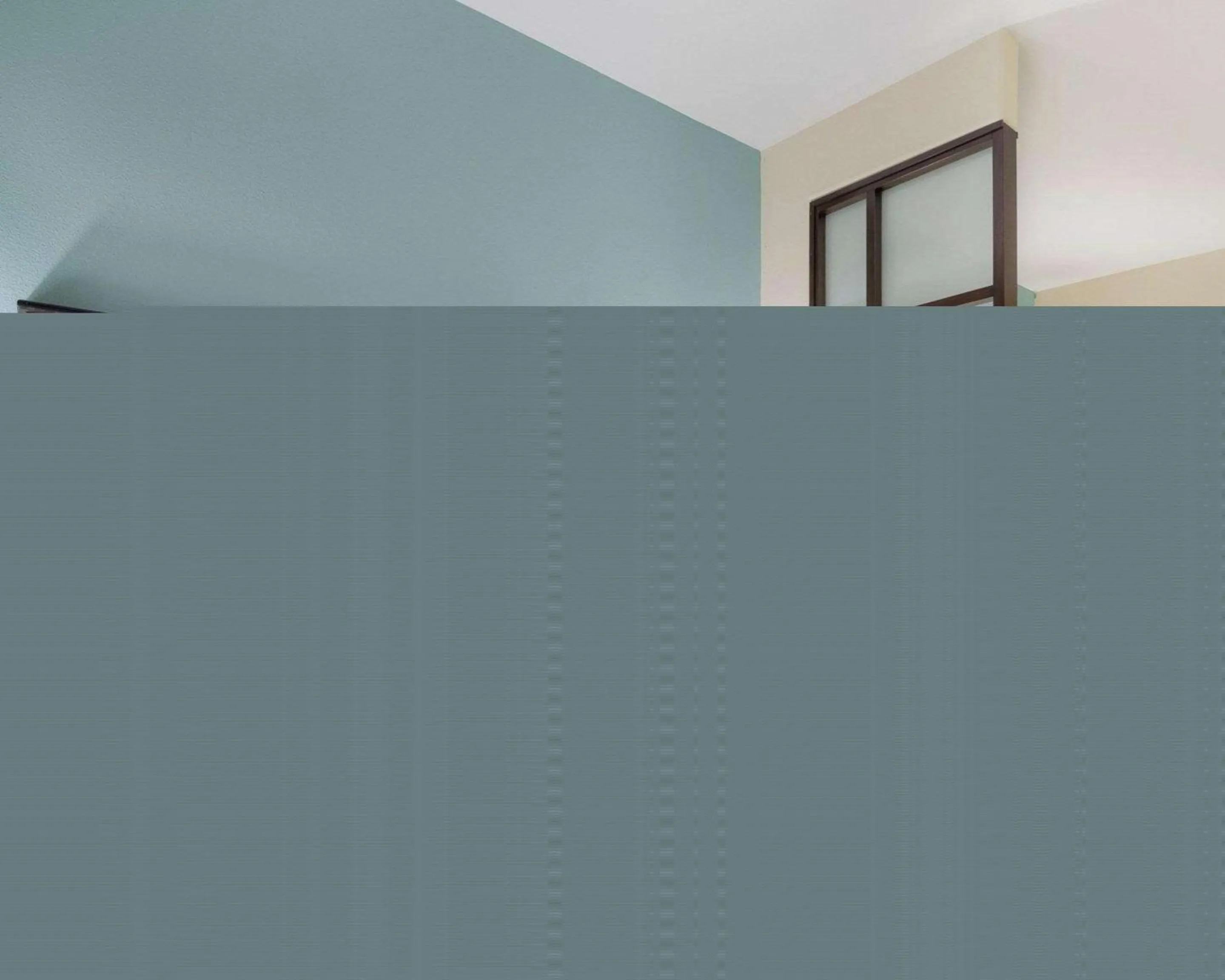 Bedroom in Comfort Suites Topeka Northwest