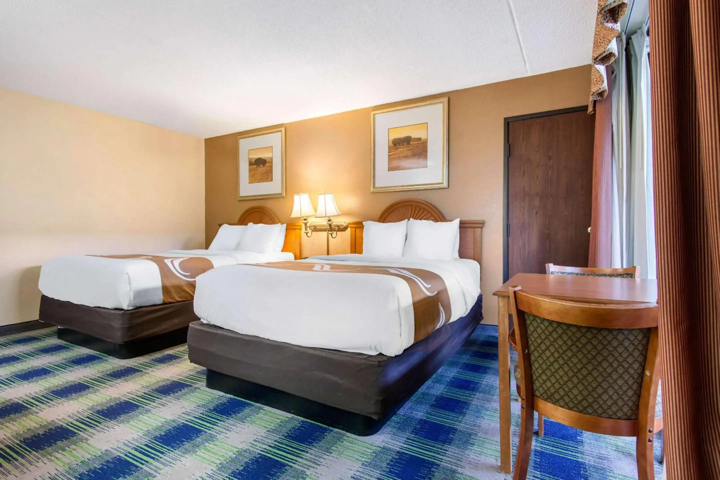 Bedroom in Quality Inn Arkansas City North Bedroom in Quality Inn Arkansas City North