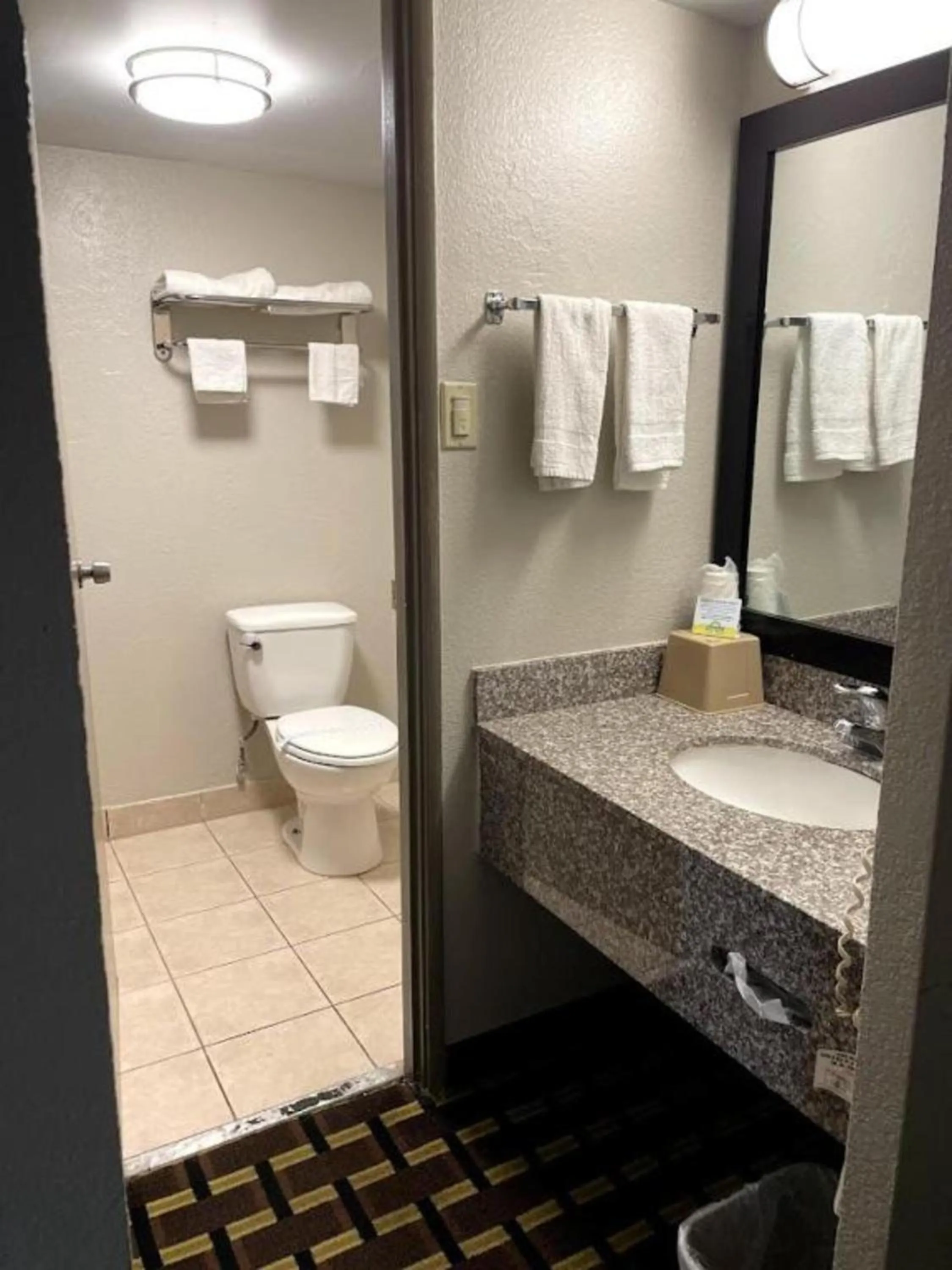 Bathroom in Days Inn by Wyndham Fort Wright Cincinnati Area