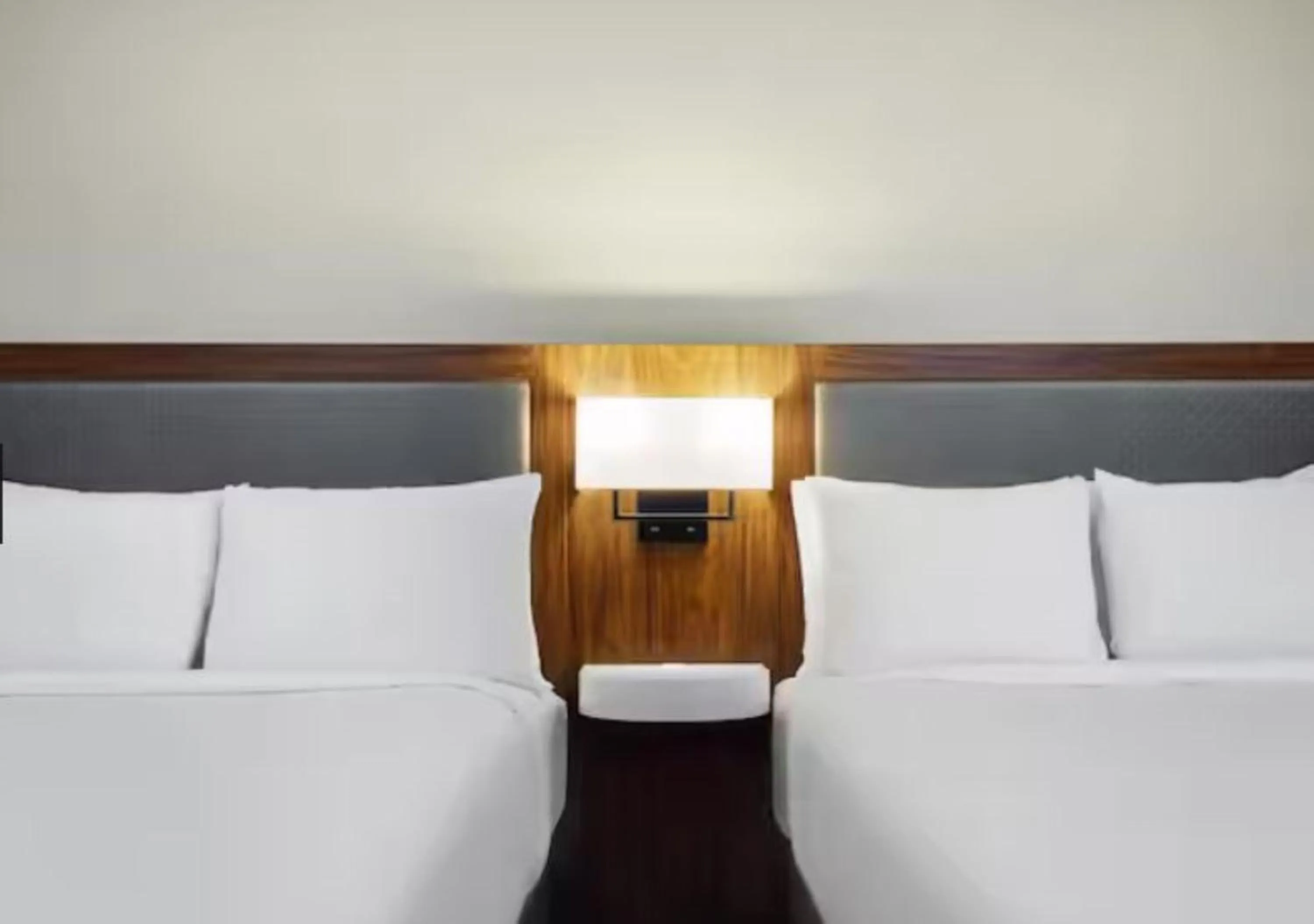 Bed in Hampton Inn & Suites New Orleans Canal St. French Quarter