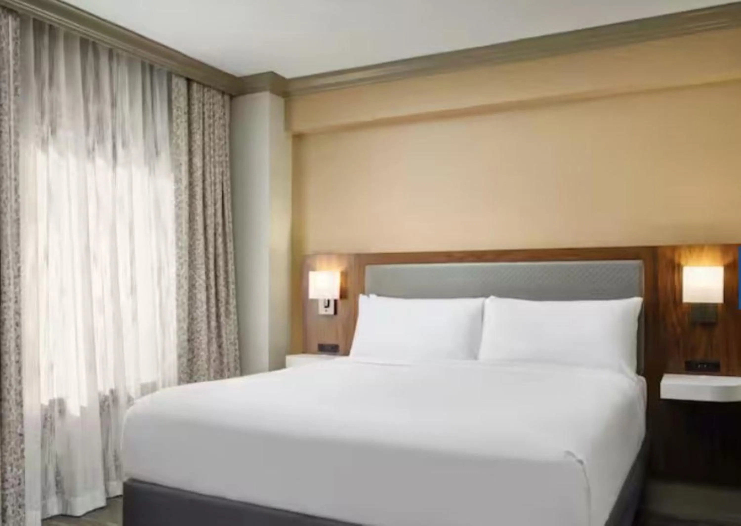 Bed in Hampton Inn & Suites New Orleans Canal St. French Quarter