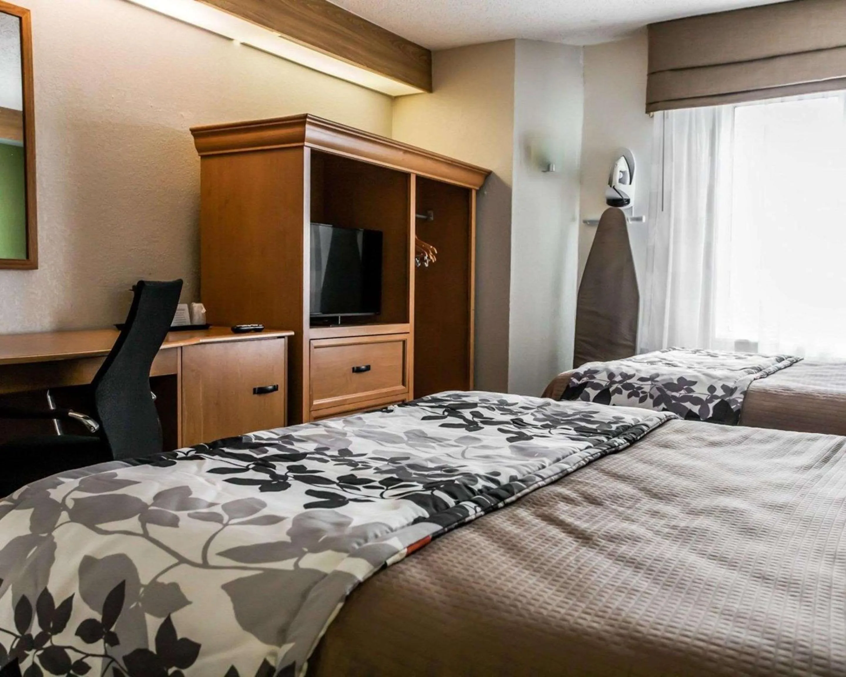 Photo of the whole room, Bed in Sleep Inn Slidell