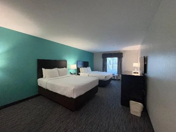 Bed in Quality Inn & Suites Houma