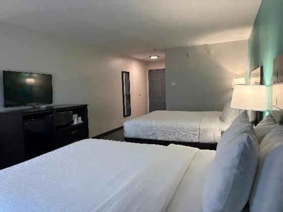 Bed in Quality Inn & Suites Houma