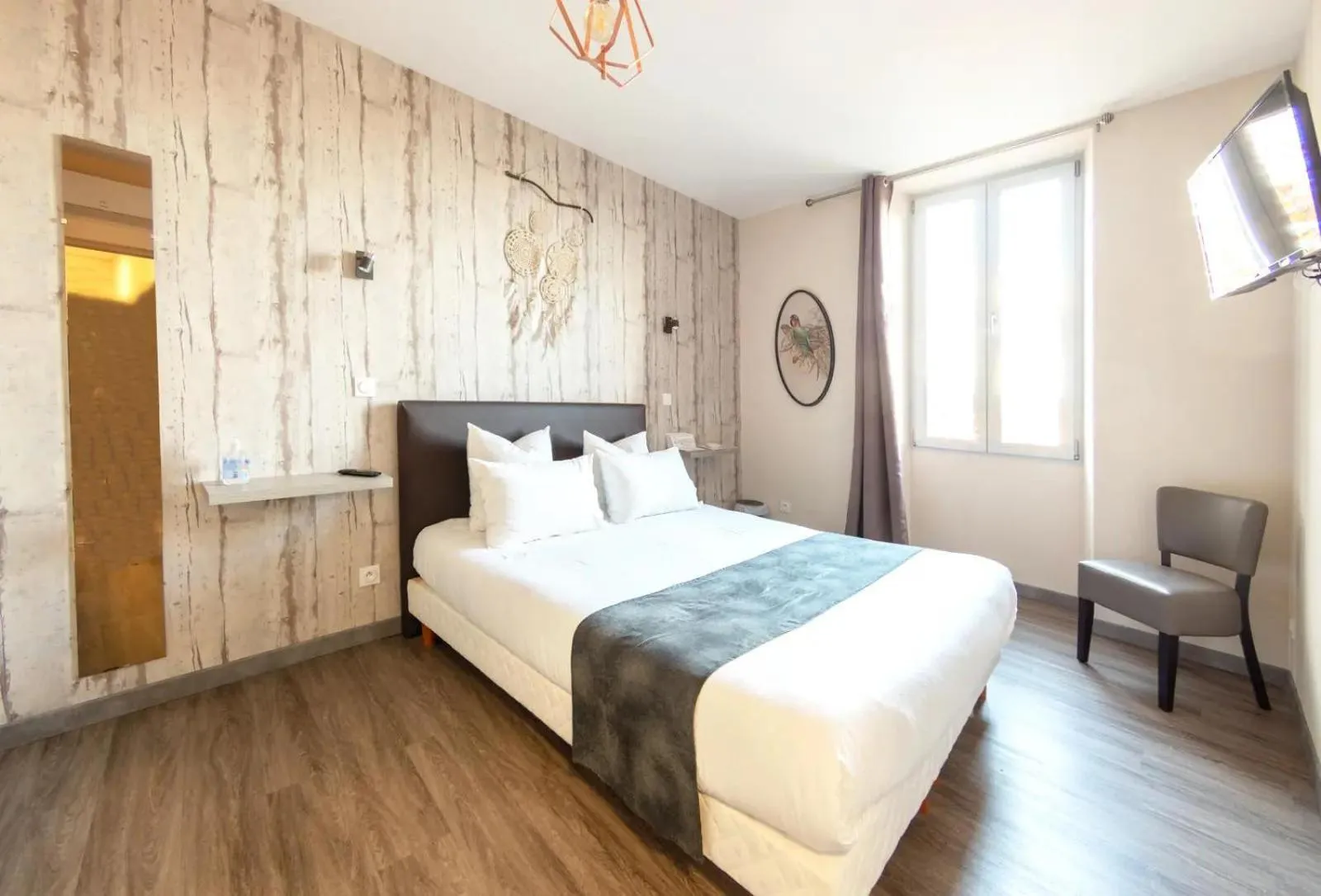 Bed in Le Relais de la Poste