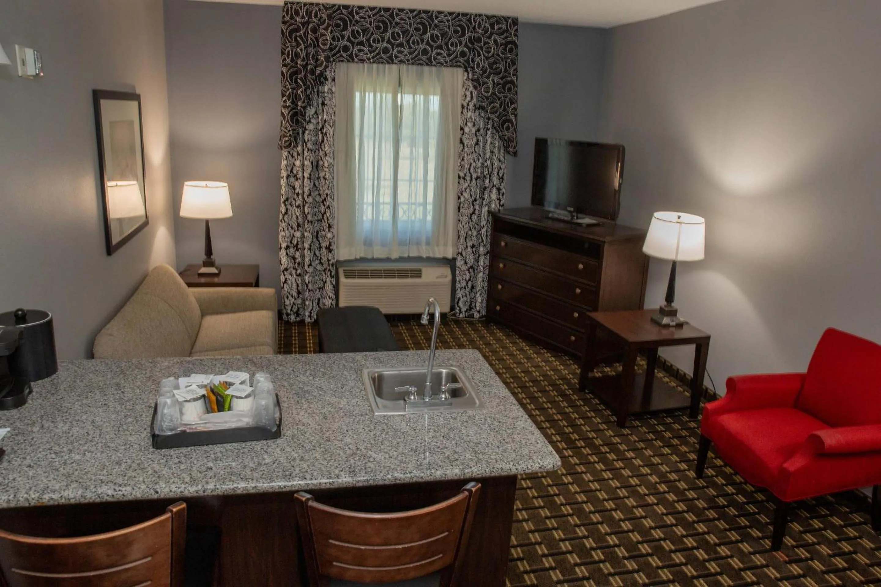 Bedroom in Evangeline Downs Hotel, an Ascend Collection Hotel