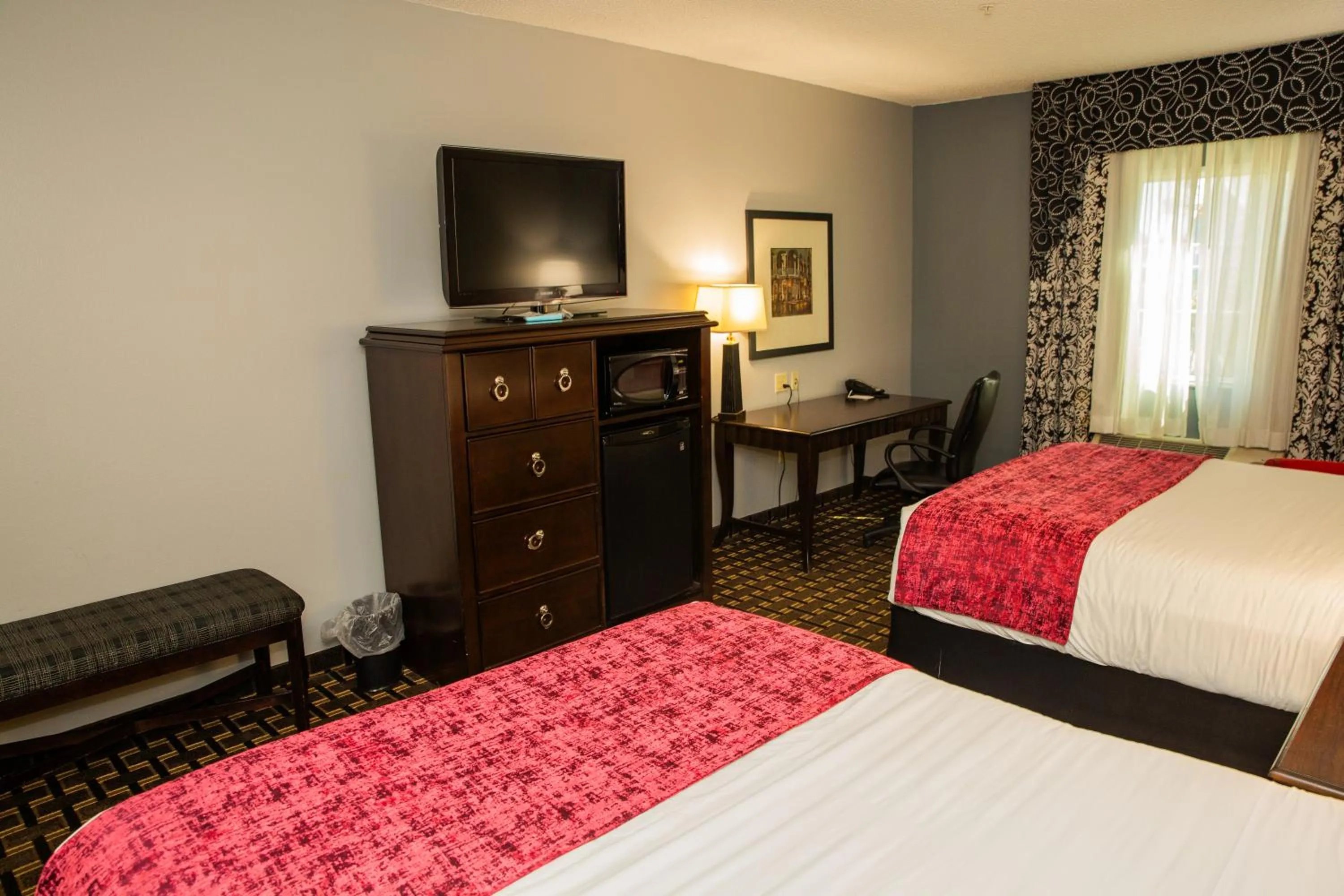 Bed in Evangeline Downs Hotel, an Ascend Collection Hotel