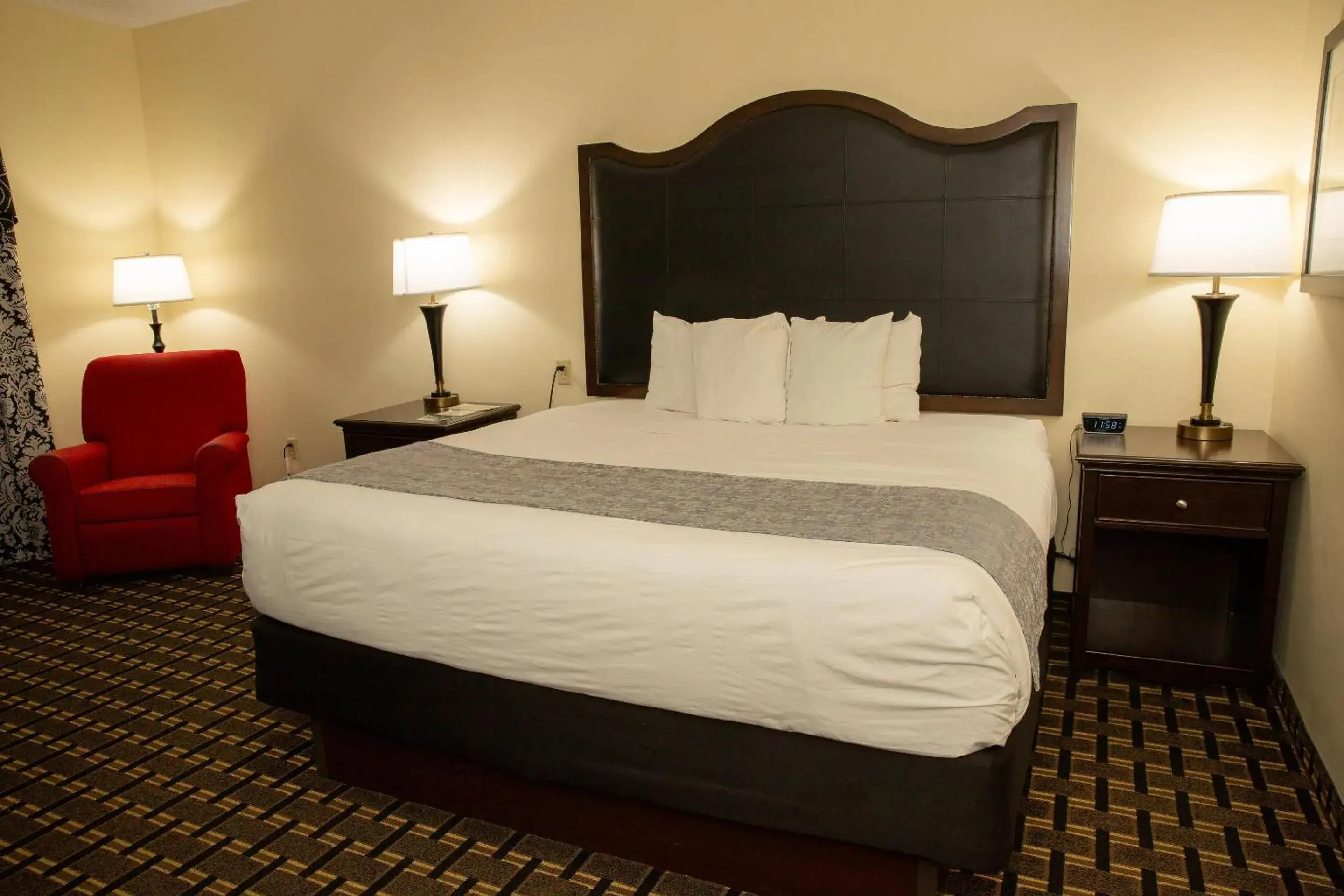 Bedroom, Bed in Evangeline Downs Hotel, an Ascend Collection Hotel Bedroom, Bed in Evangeline Downs Hotel, an Ascend Collection Hotel