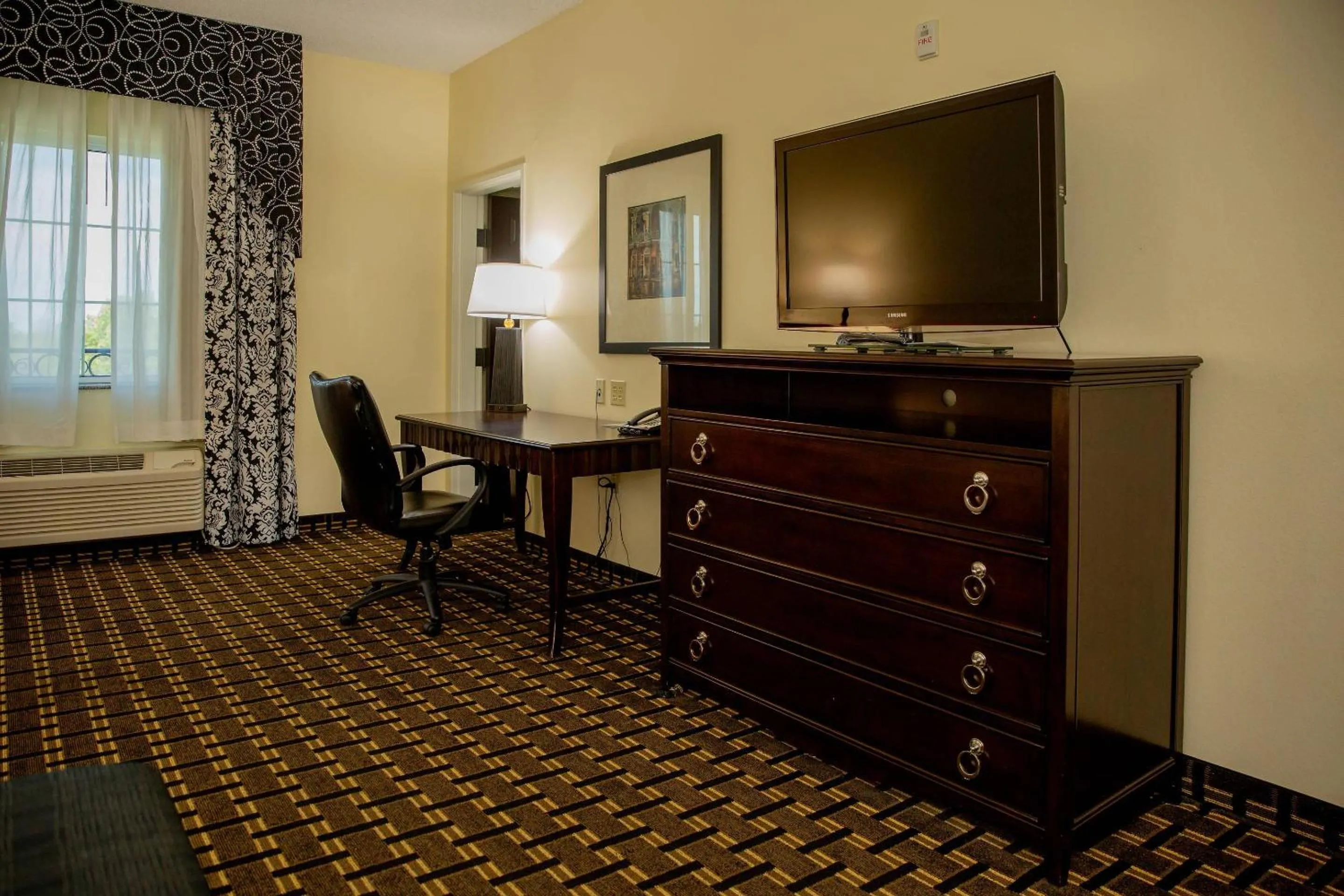 Bedroom in Evangeline Downs Hotel, an Ascend Collection Hotel