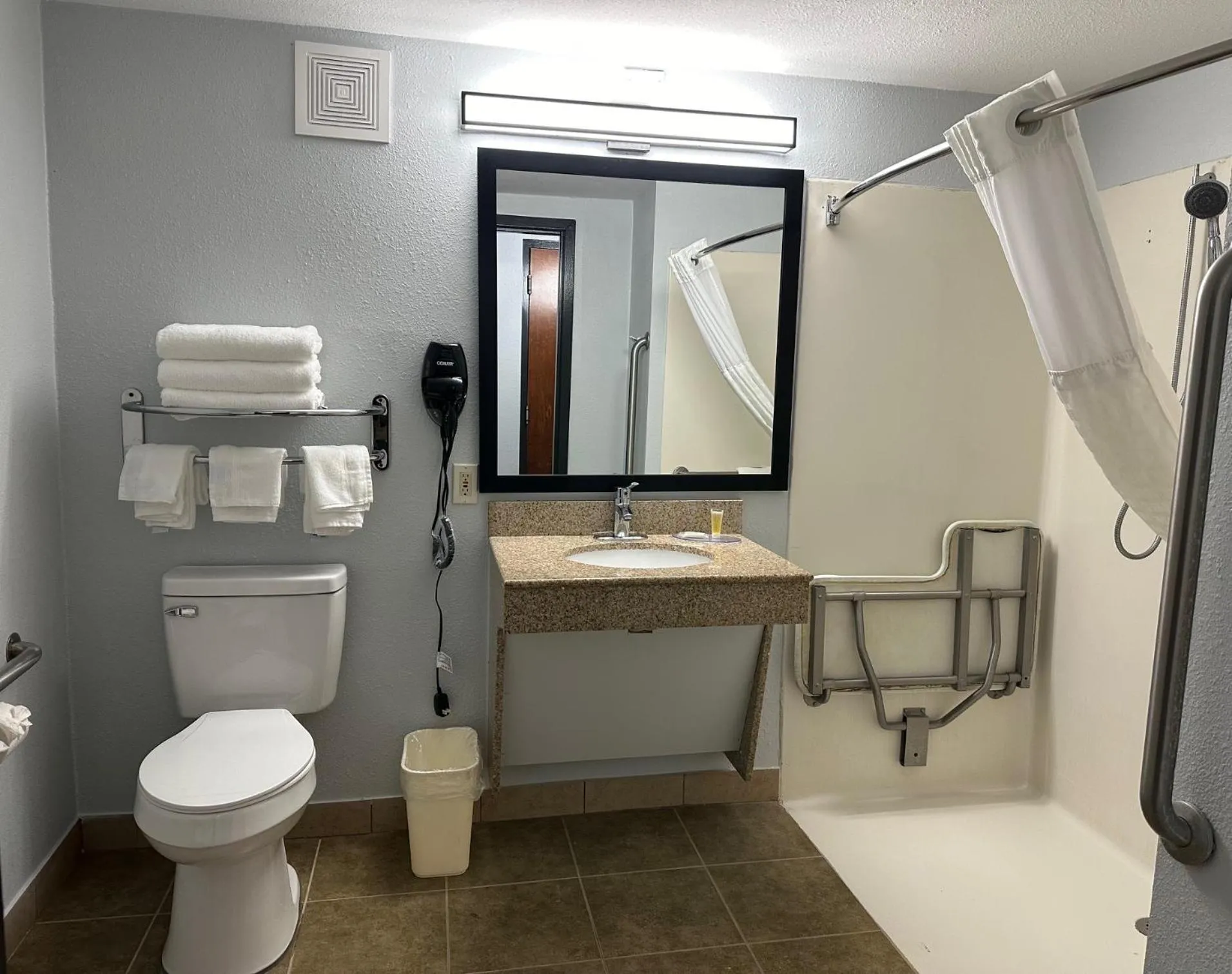 Shower in Super 8 by Wyndham Alexandria LA