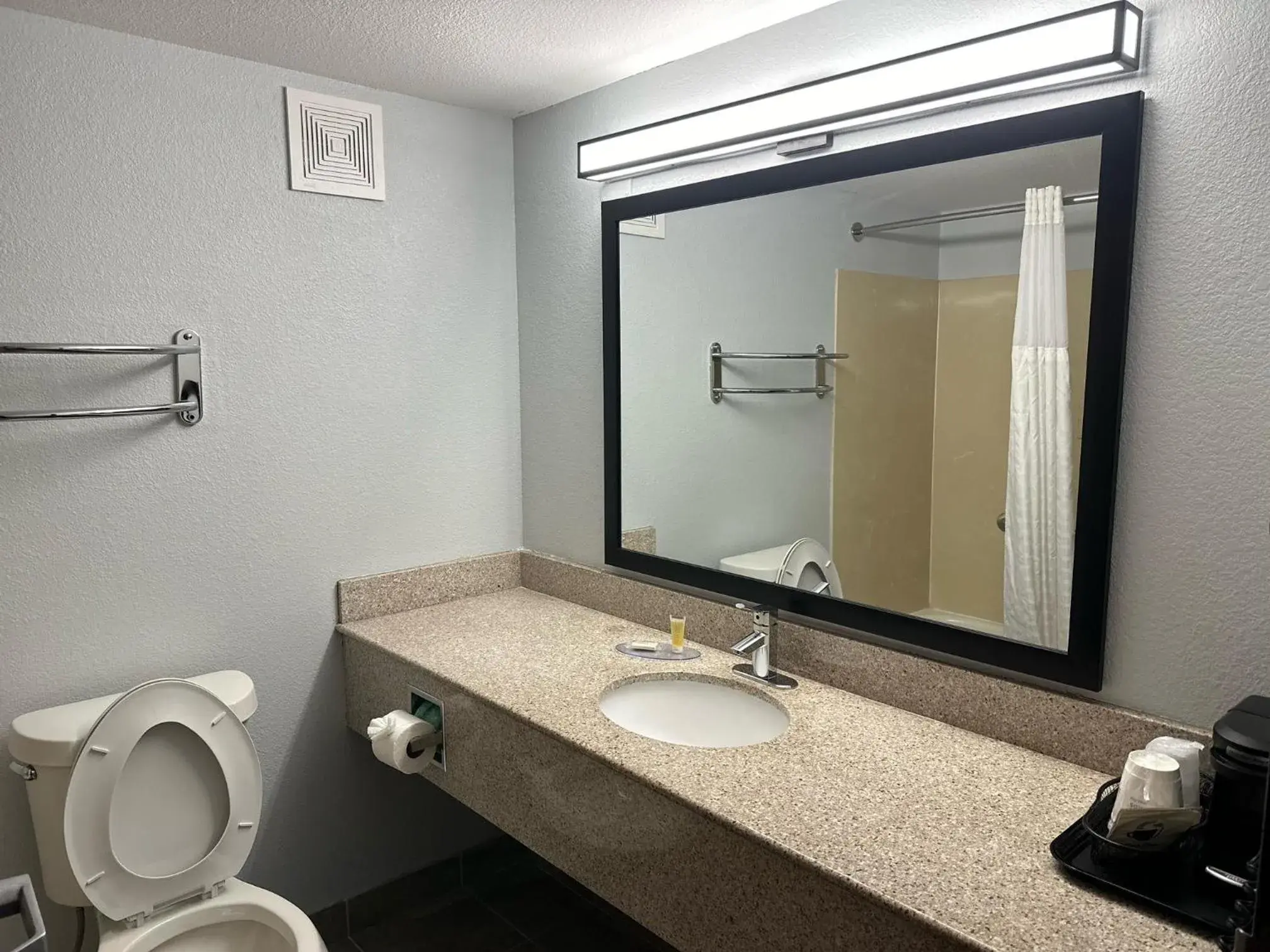 Toilet, Bathroom in Super 8 by Wyndham Alexandria LA