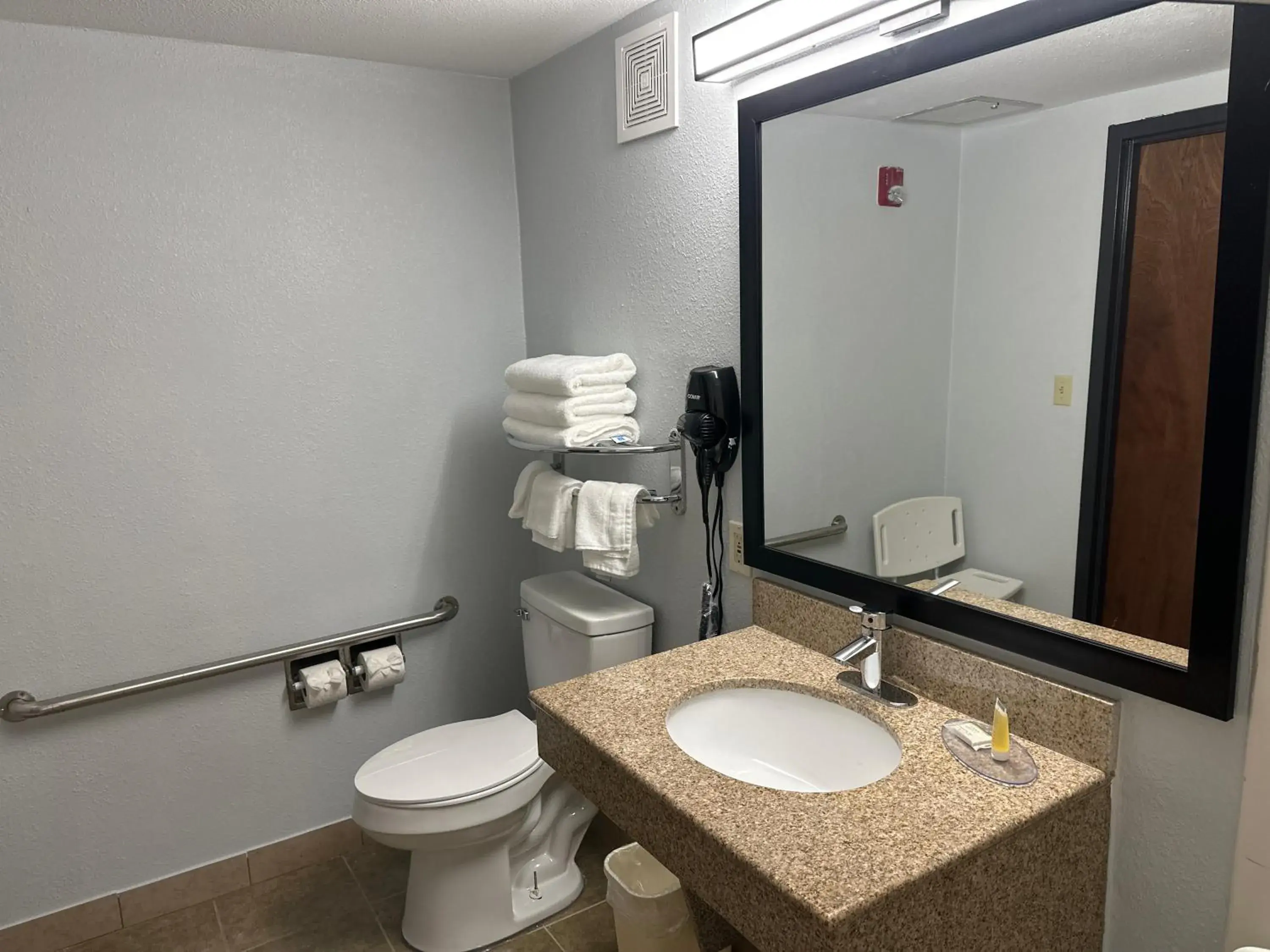 Bathroom in Super 8 by Wyndham Alexandria LA