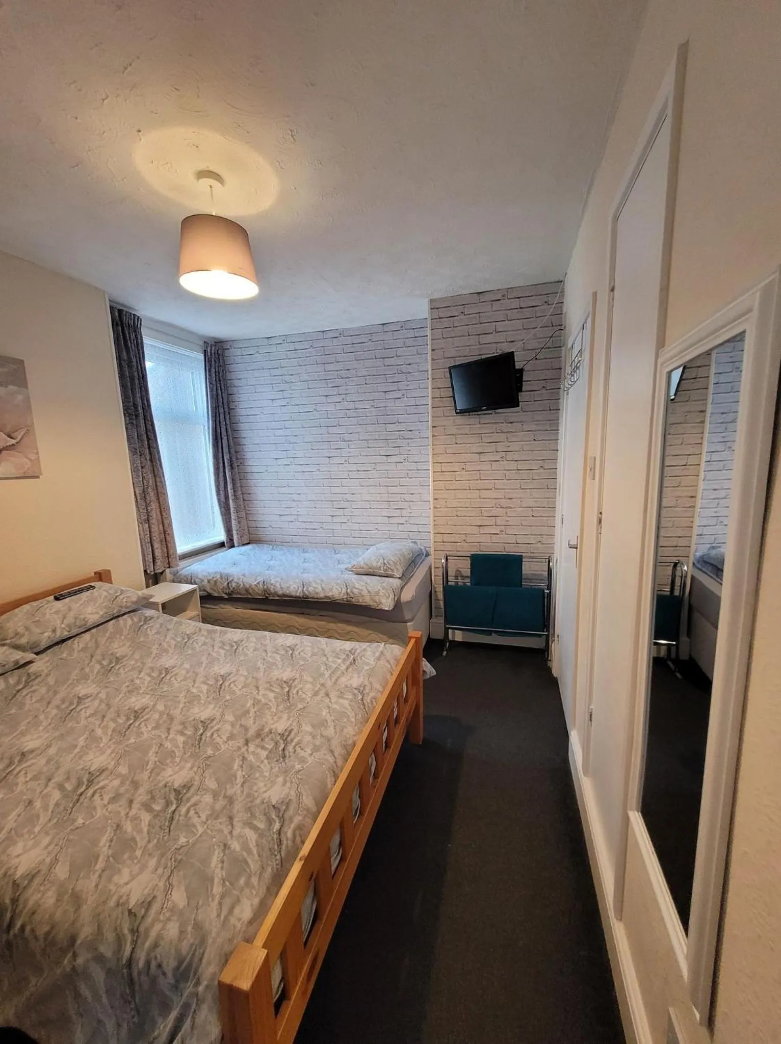 Photo of the whole room, Bed in The Clevedon